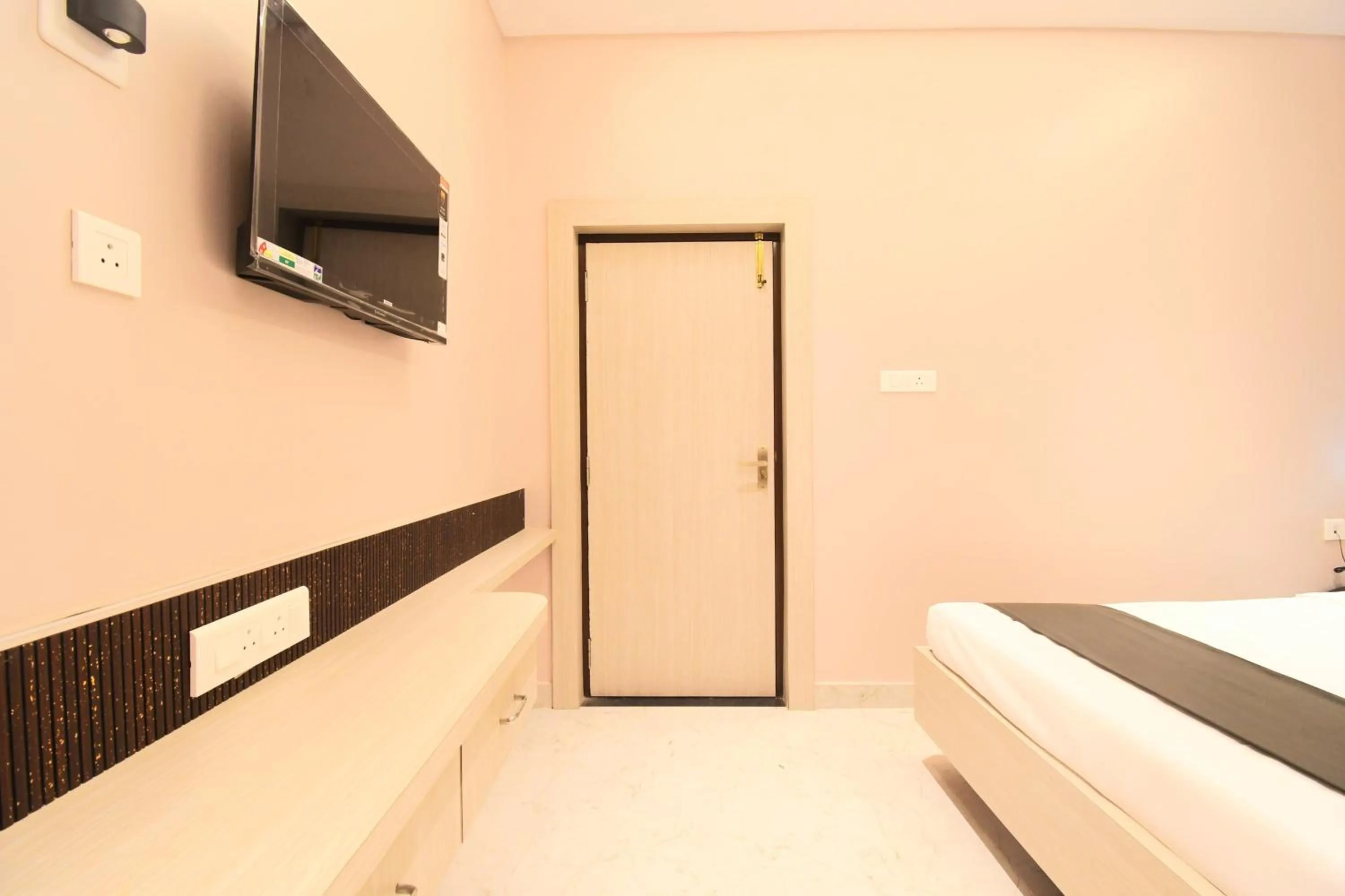 Bed in Hotel Sai Swastik