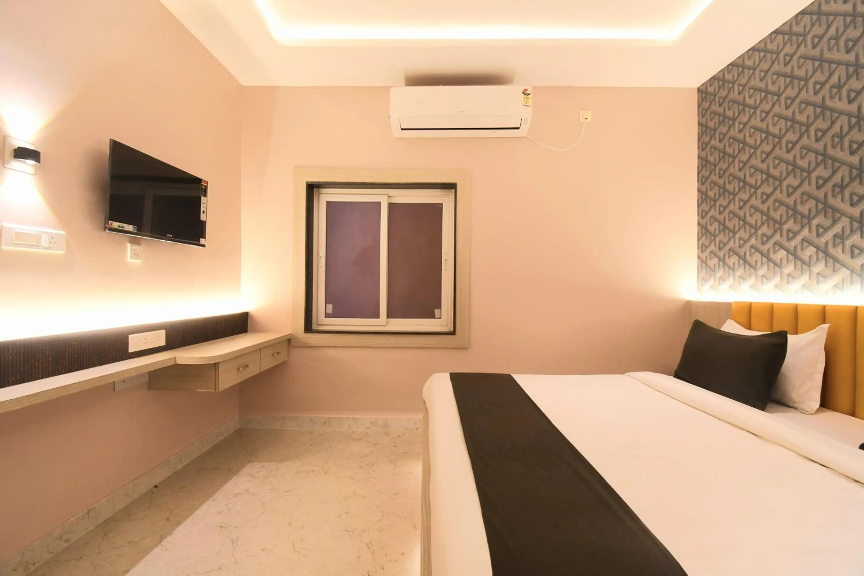 Bed in Hotel Sai Swastik