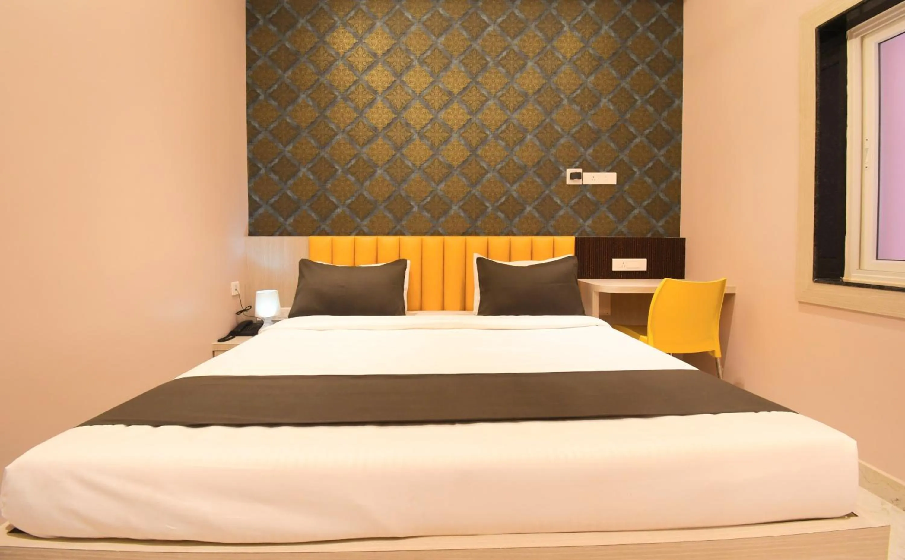 Bed in Hotel Sai Swastik