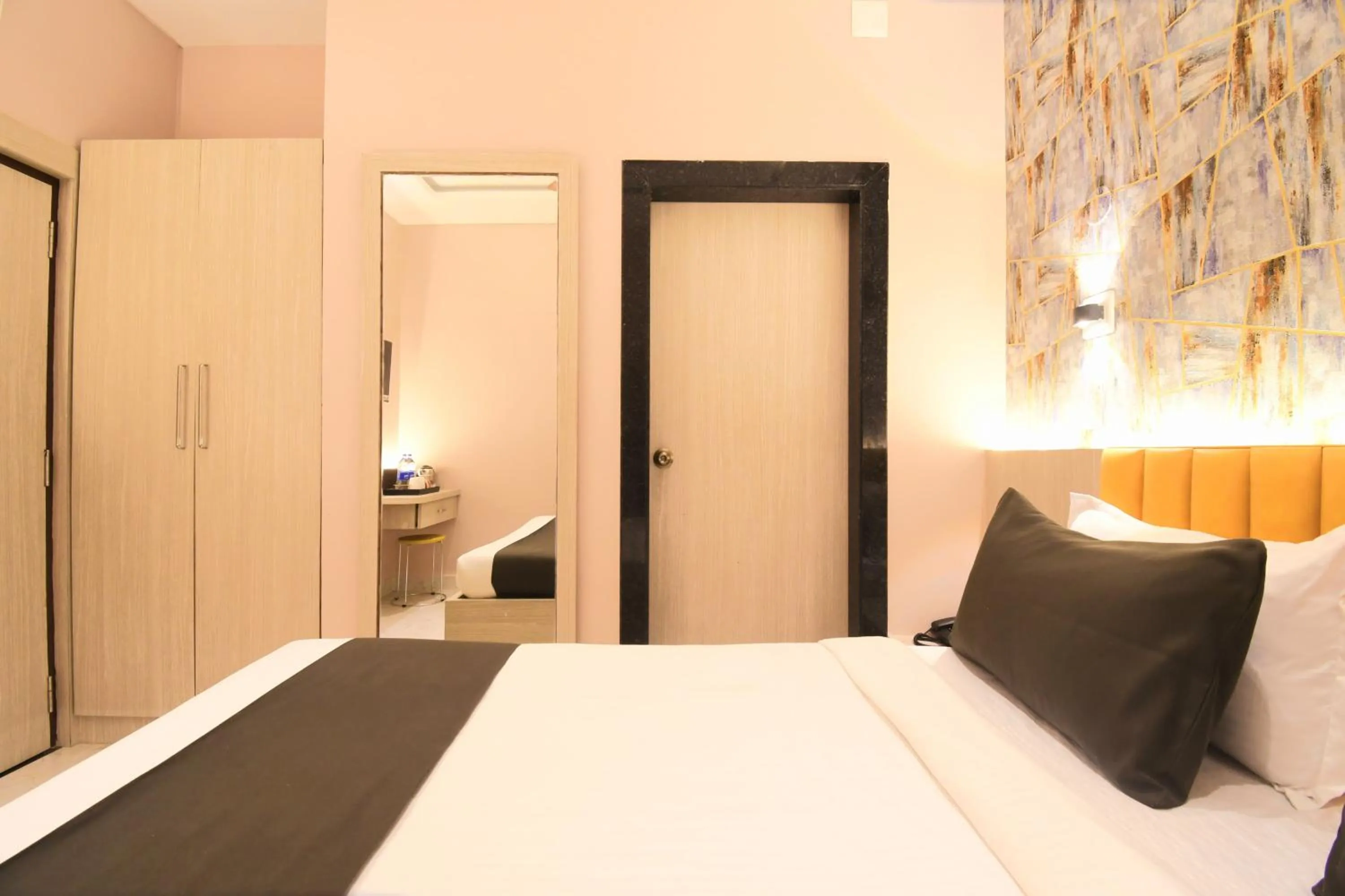 Bed in Hotel Sai Swastik