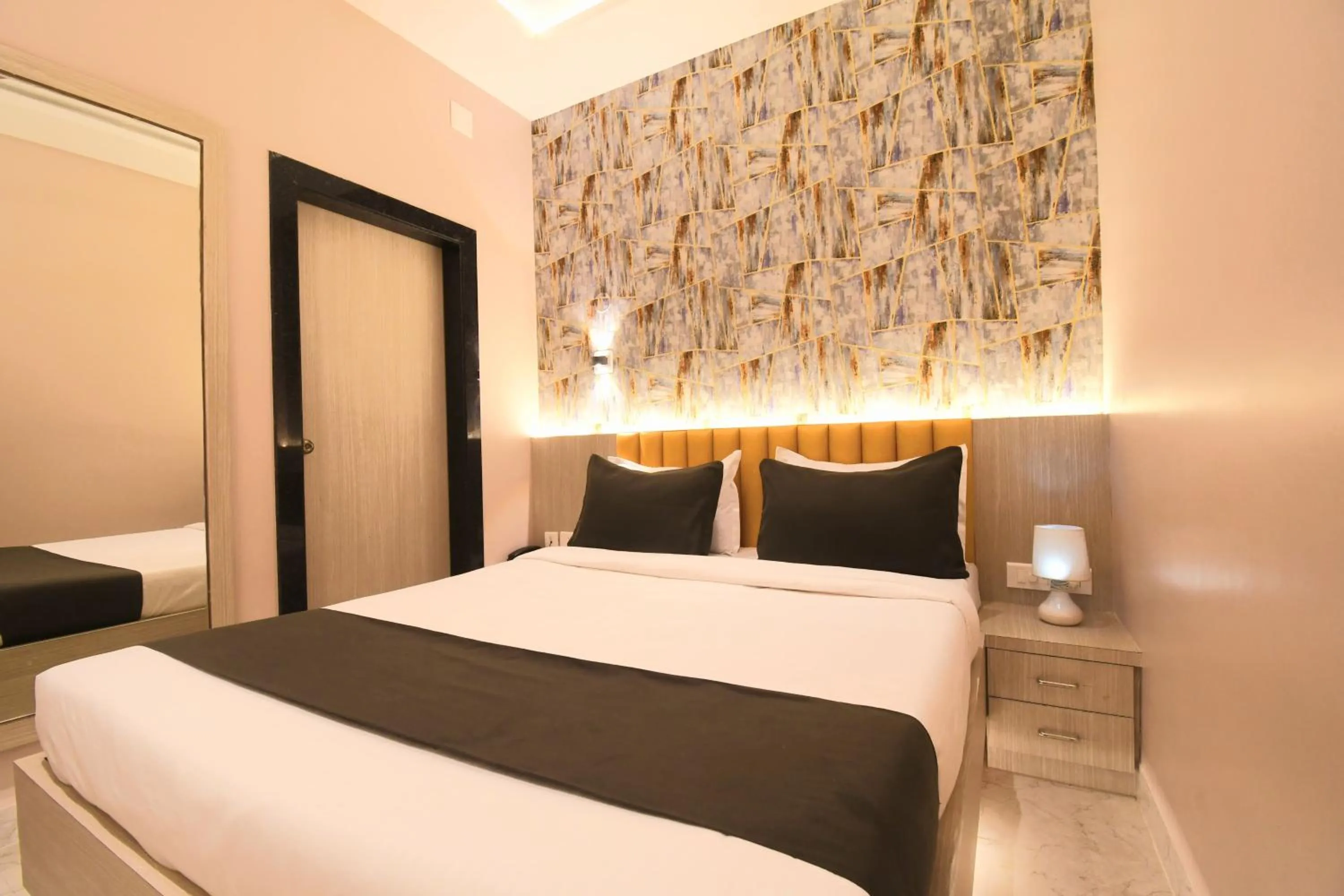 Bed in Hotel Sai Swastik