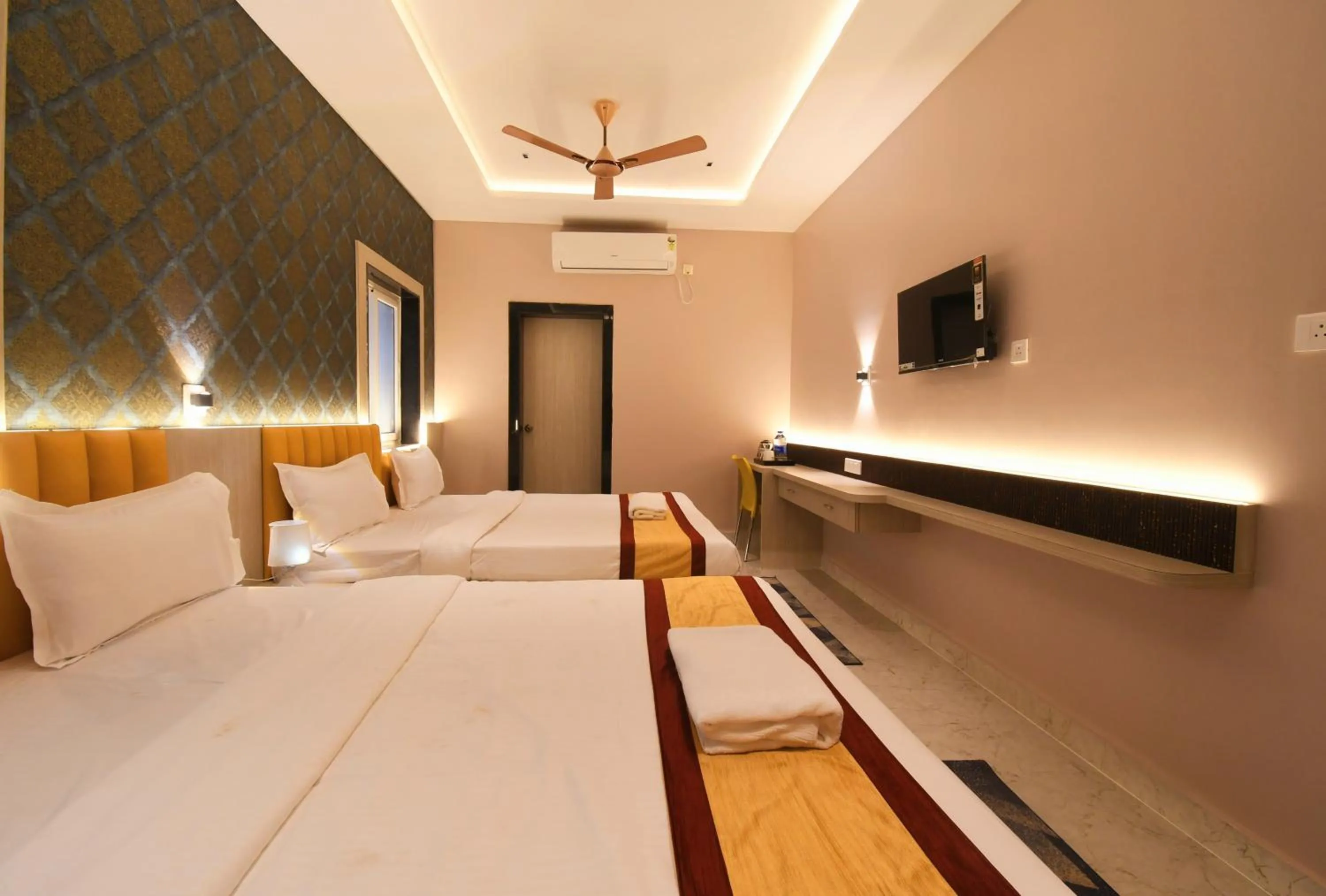 Bed in Hotel Sai Swastik