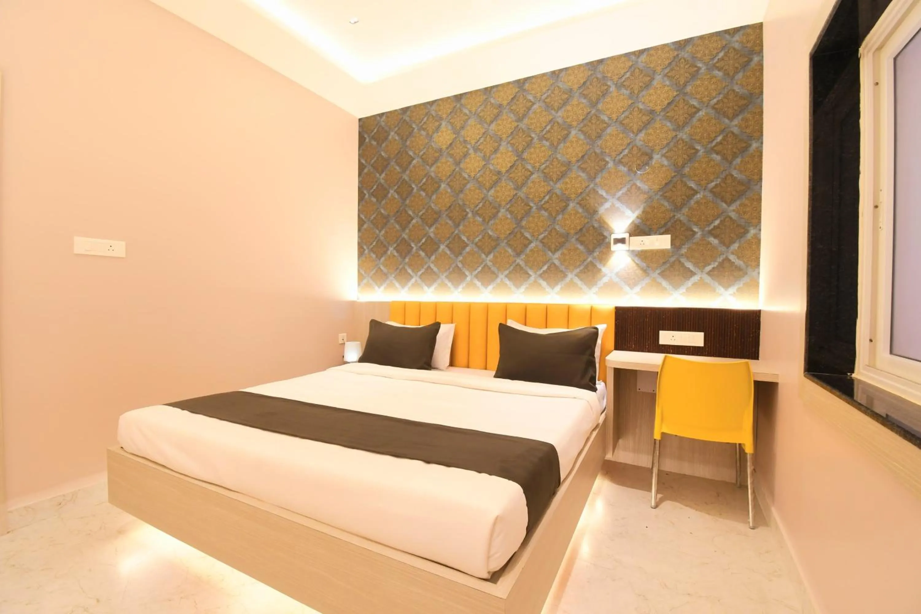 Bed in Hotel Sai Swastik