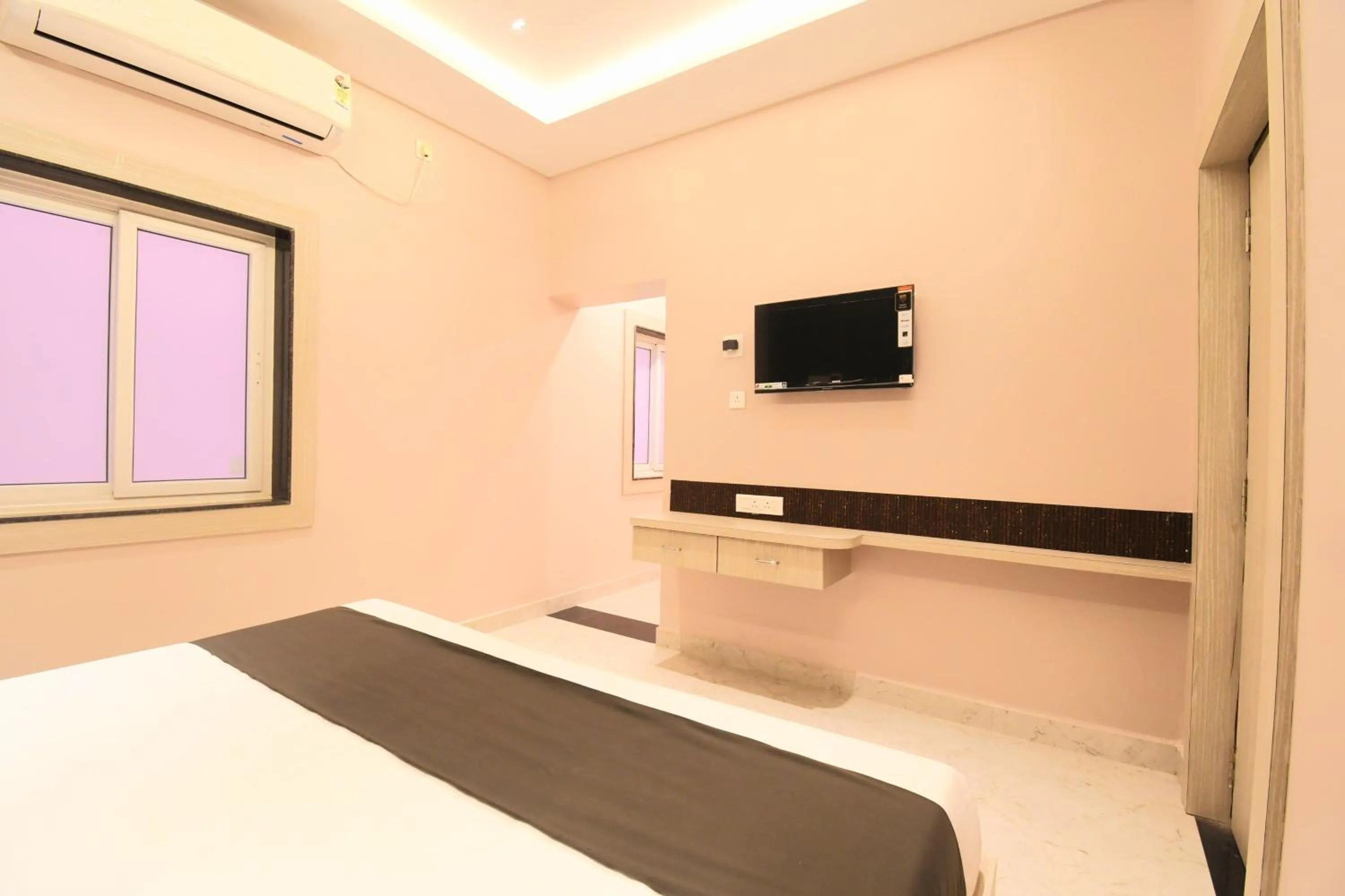 Bed in Hotel Sai Swastik