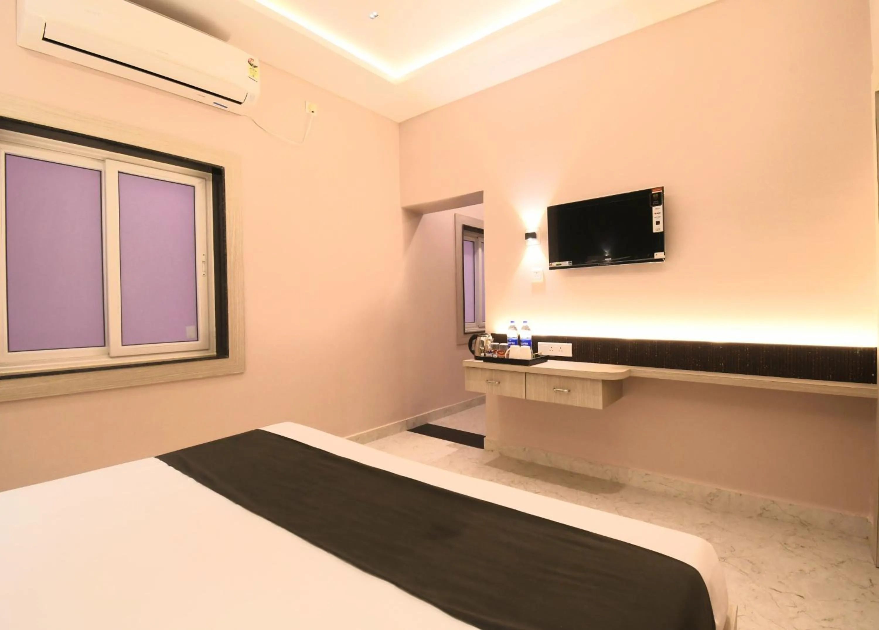 Bed in Hotel Sai Swastik