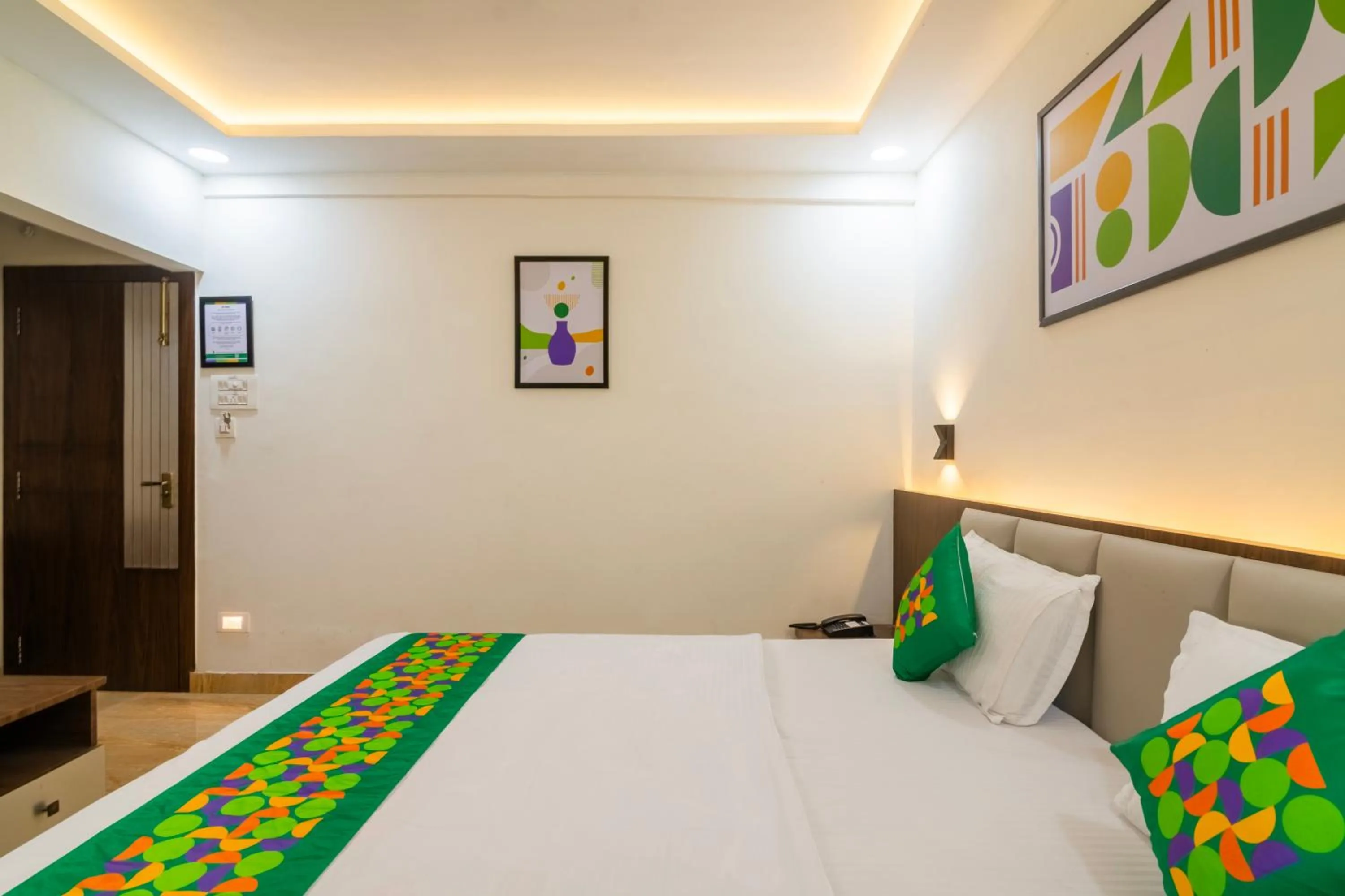 Bedroom, Bed in Treebo Petals Suites & Banquet - New Town