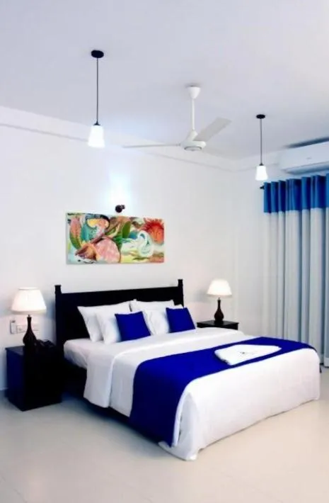 Bed in Blue Spring Hotel Wadduwa