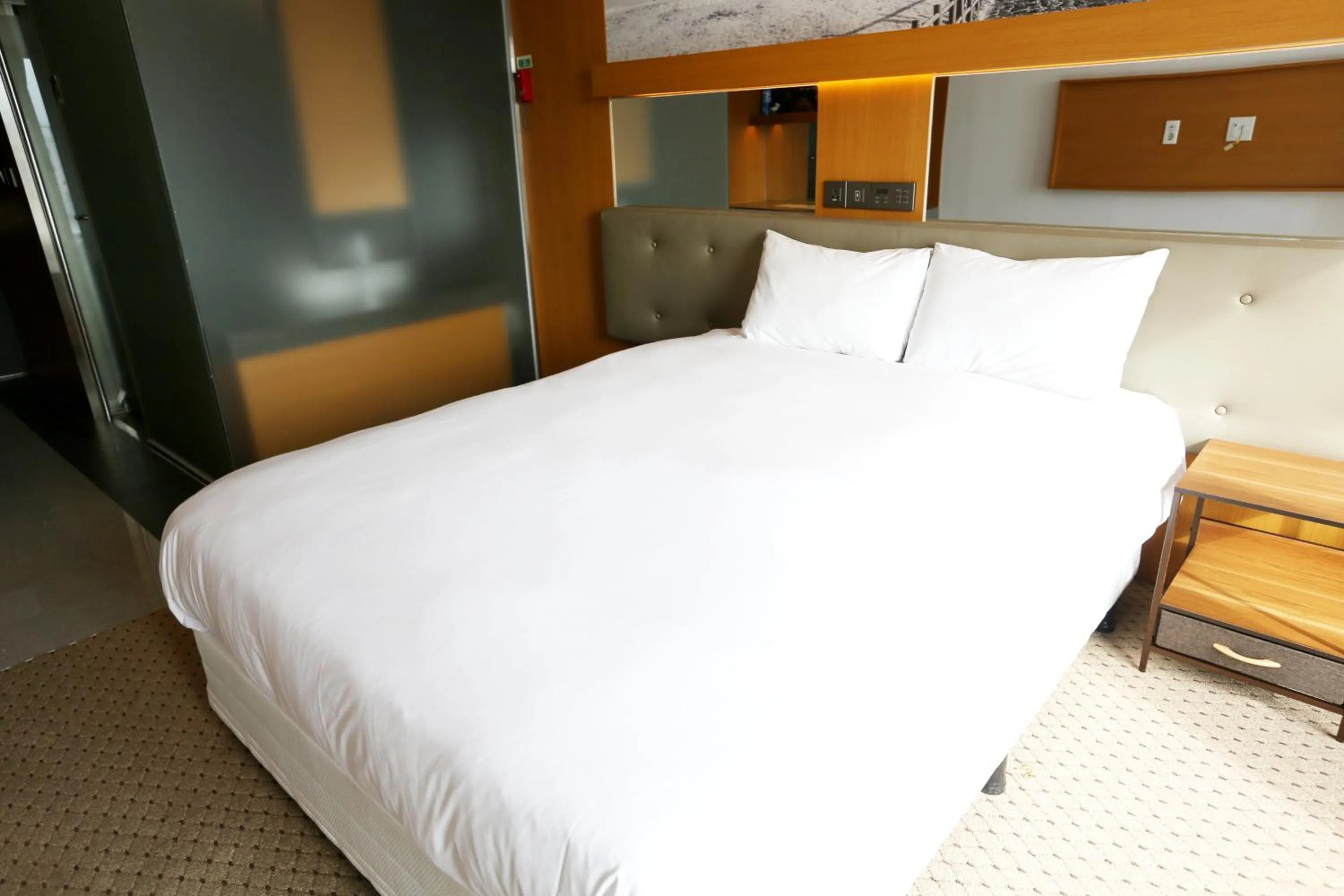 Bed in Asia Hotel Jeju