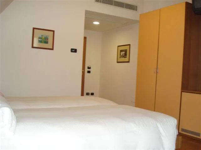 Bed in Hotel Lario