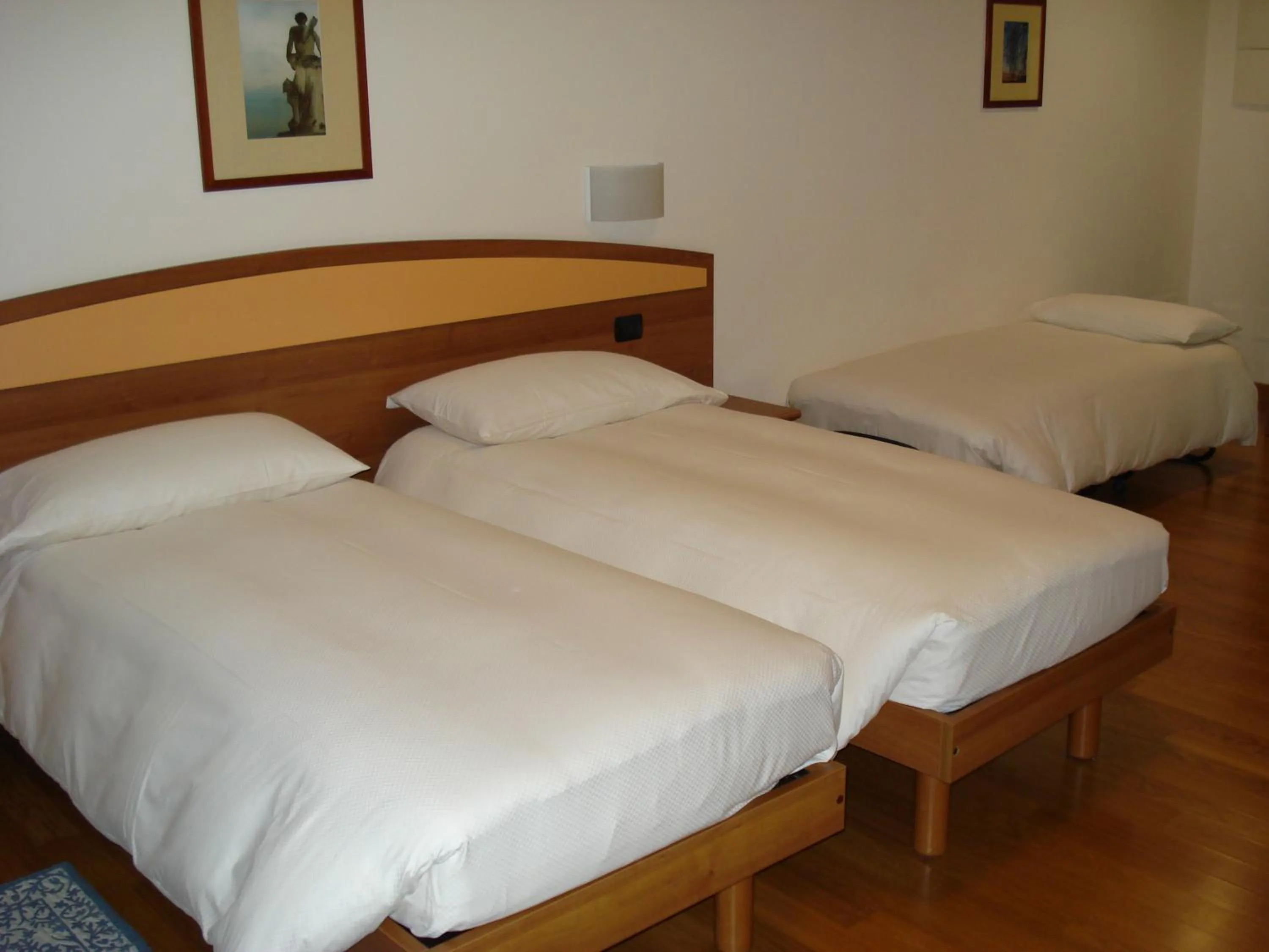 Bed in Hotel Lario