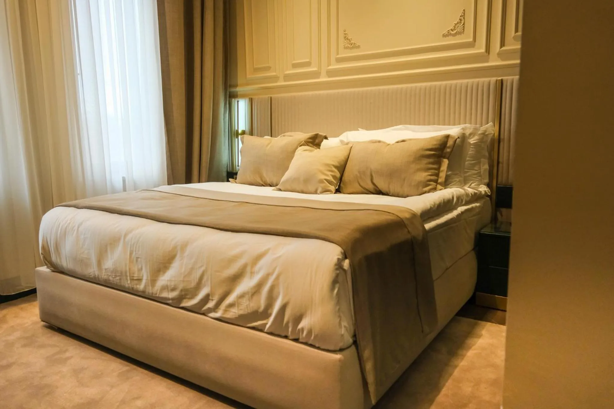 Bed in Sur Royal's Hotel