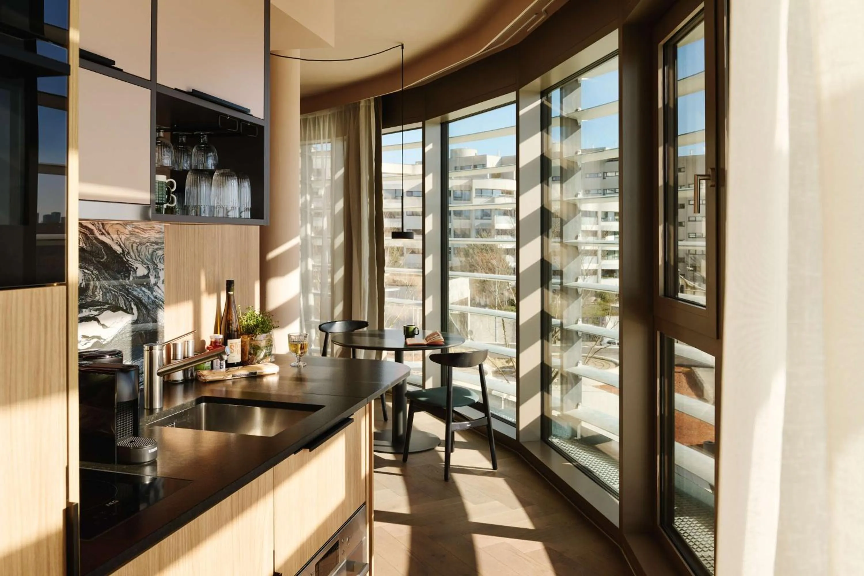 Kitchen or kitchenette in A by Adina Vienna Danube