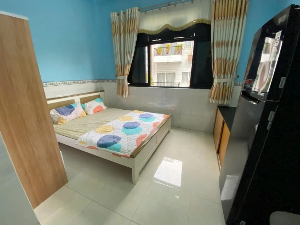 Bed in Sky Center Apartment