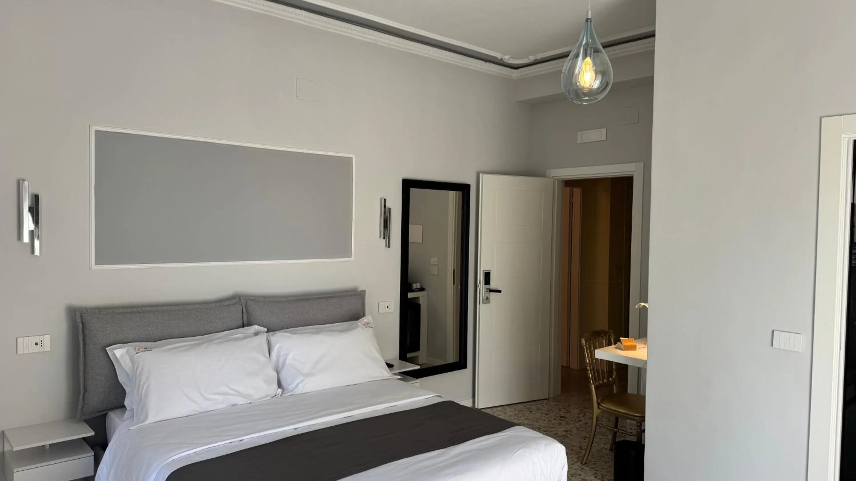 Bed in AC GOLD B&B Boutique Rooms & Suite