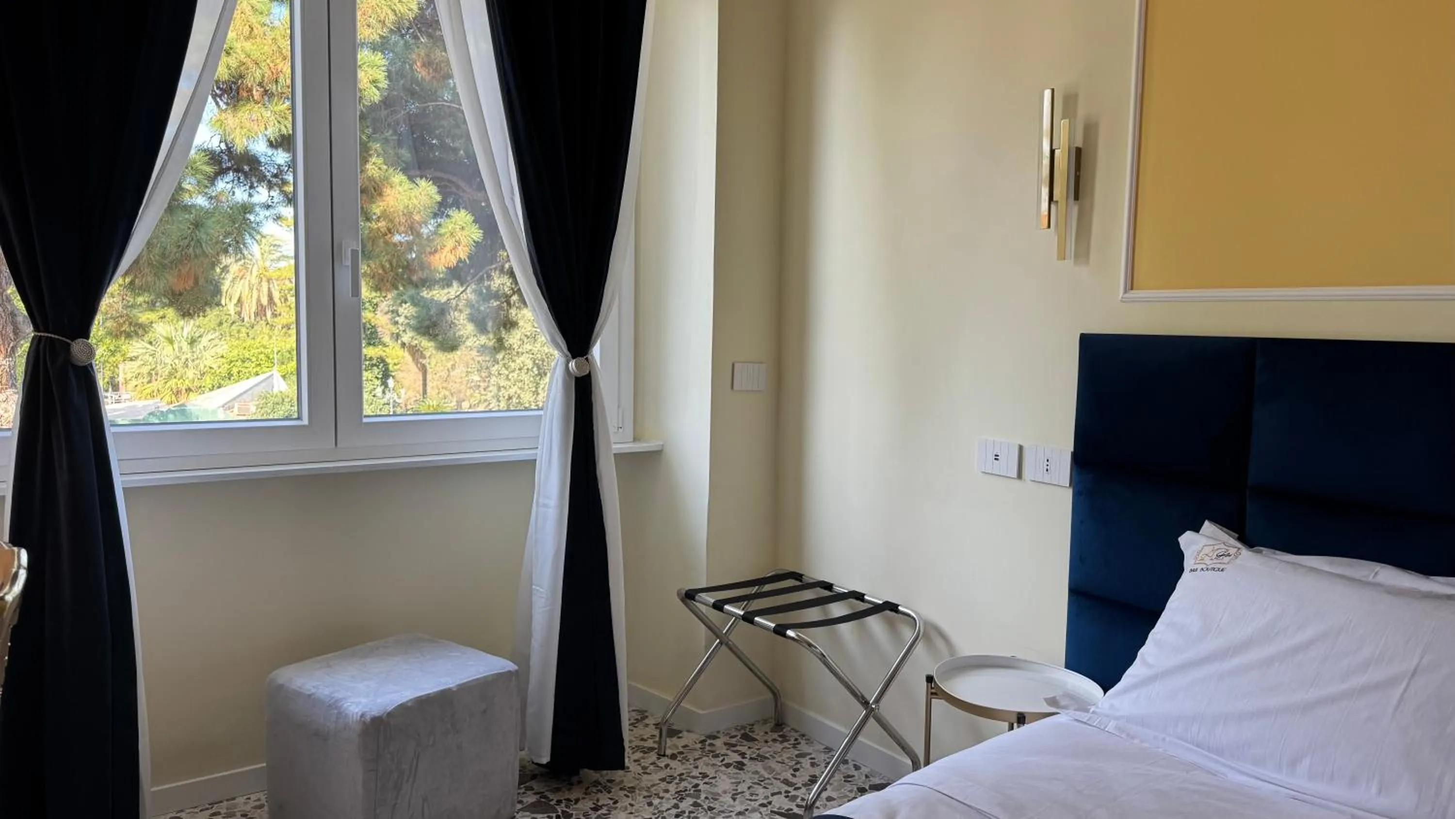 Bed in AC GOLD B&B Boutique Rooms & Suite