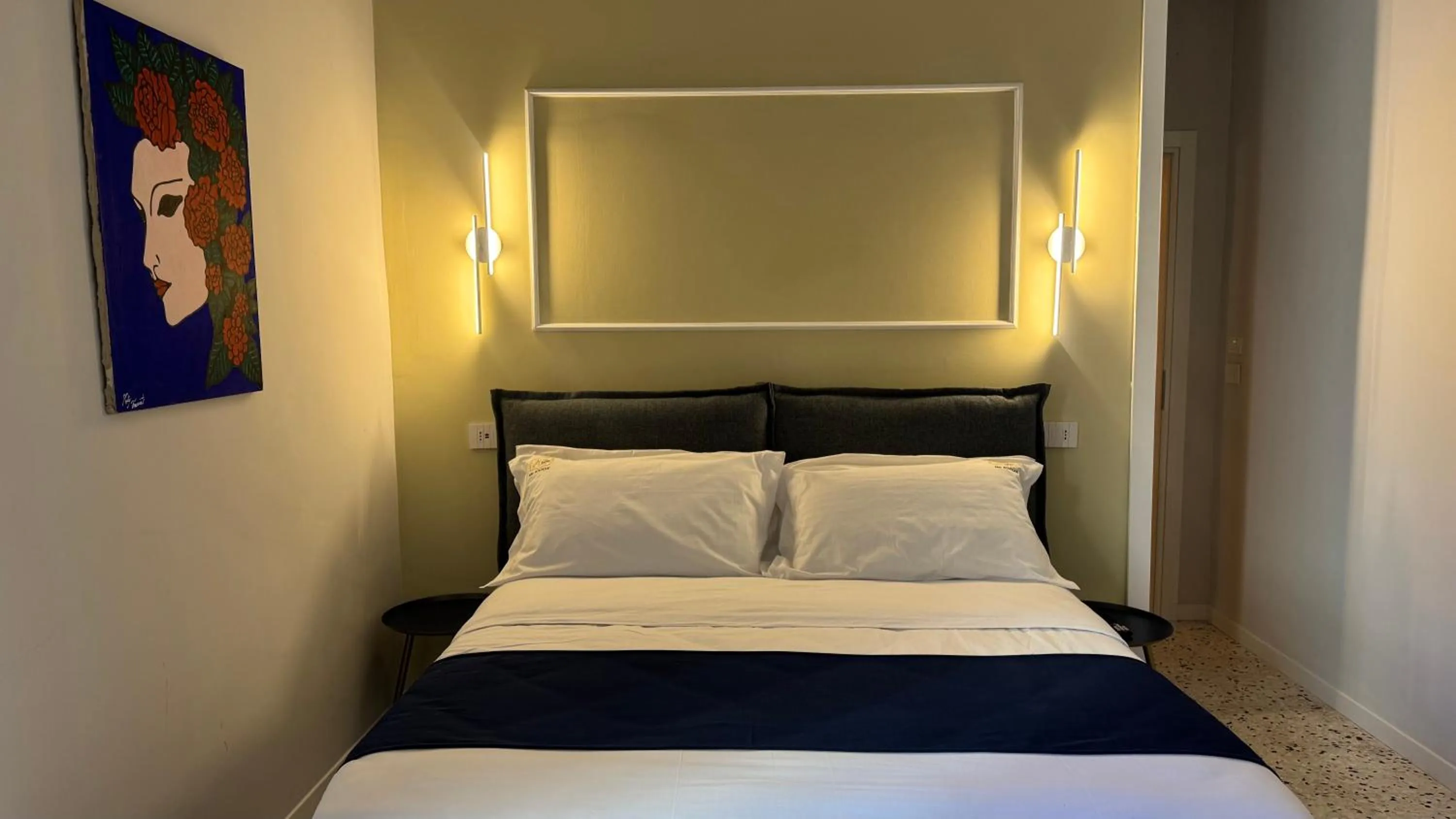 Bed in AC GOLD B&B Boutique Rooms & Suite