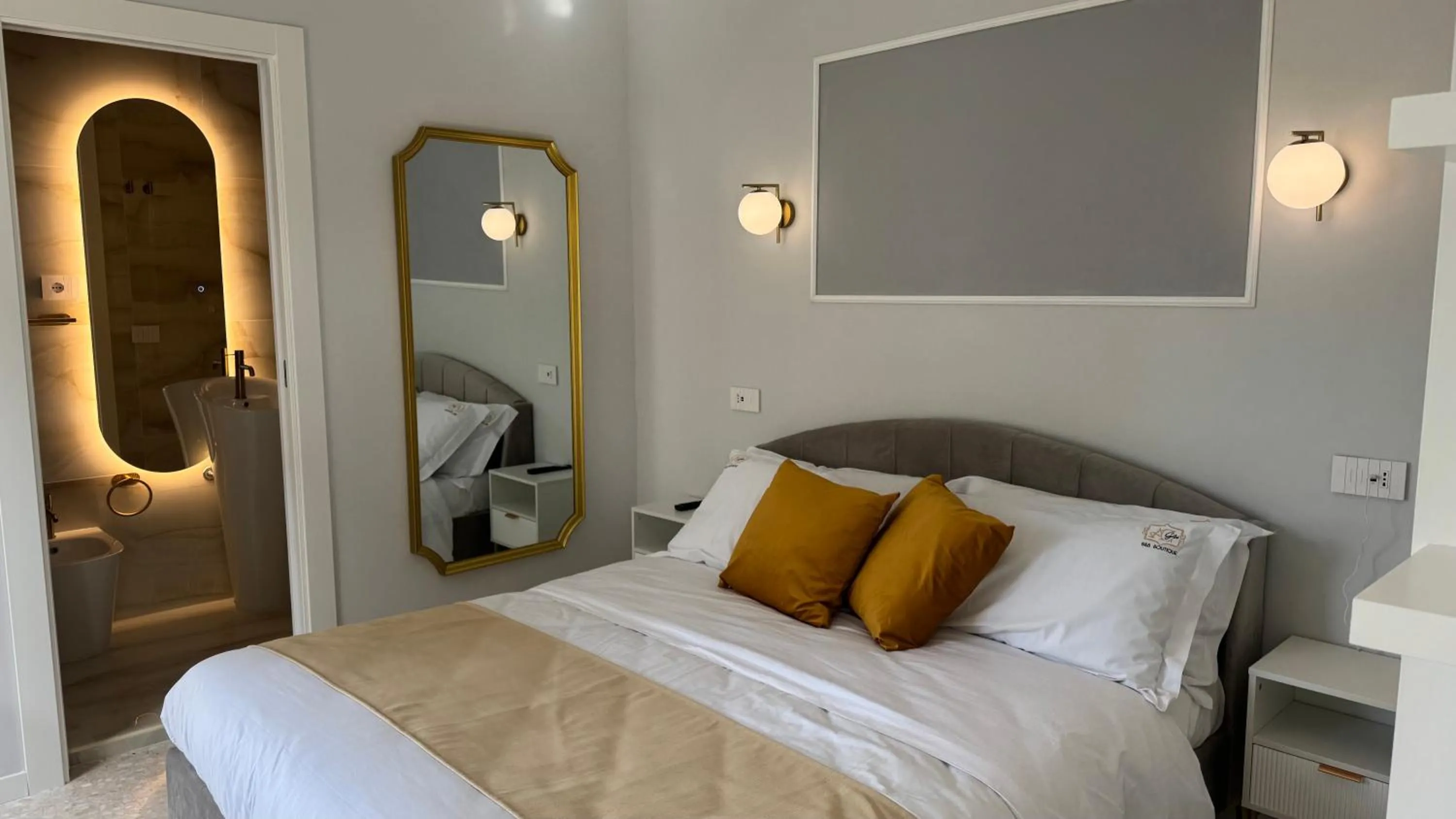 Bed in AC GOLD B&B Boutique Rooms & Suite