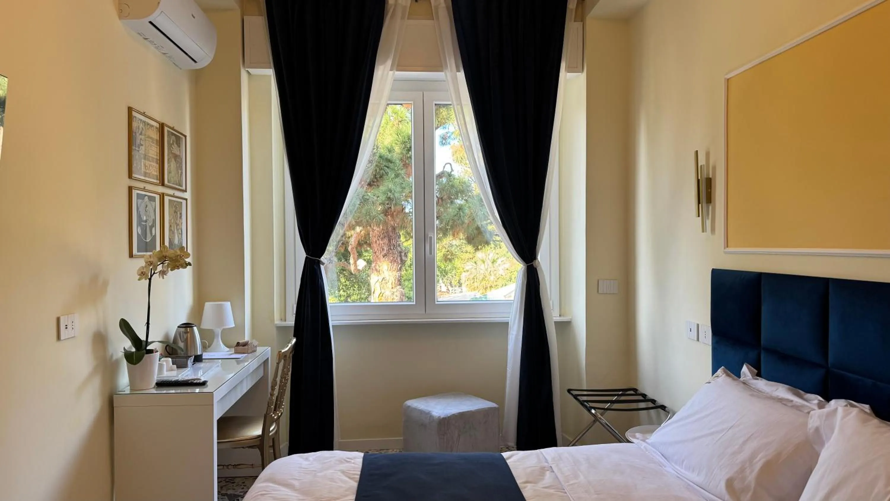 Bed in AC GOLD B&B Boutique Rooms & Suite