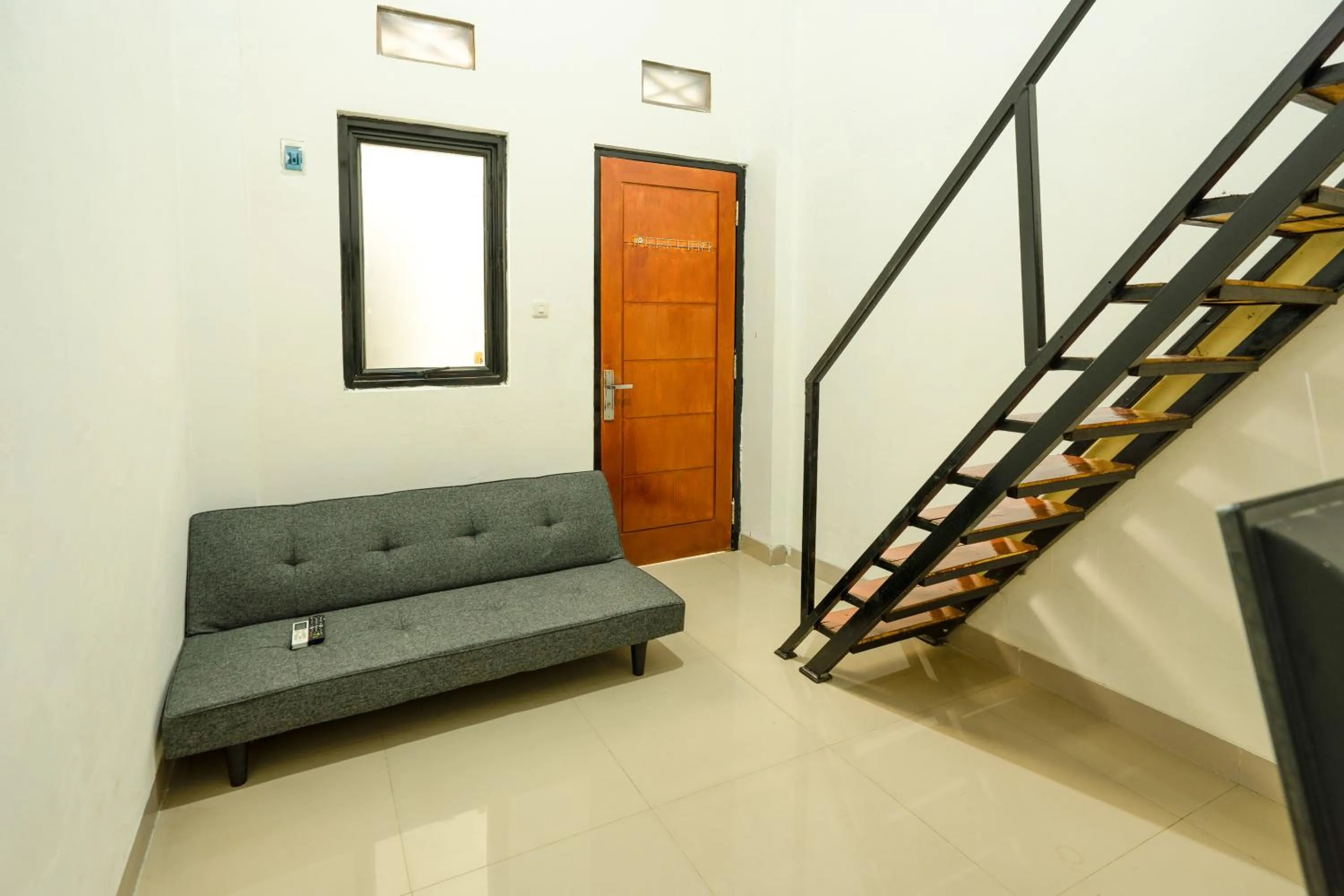 Seating area in CQA Living By ARBA