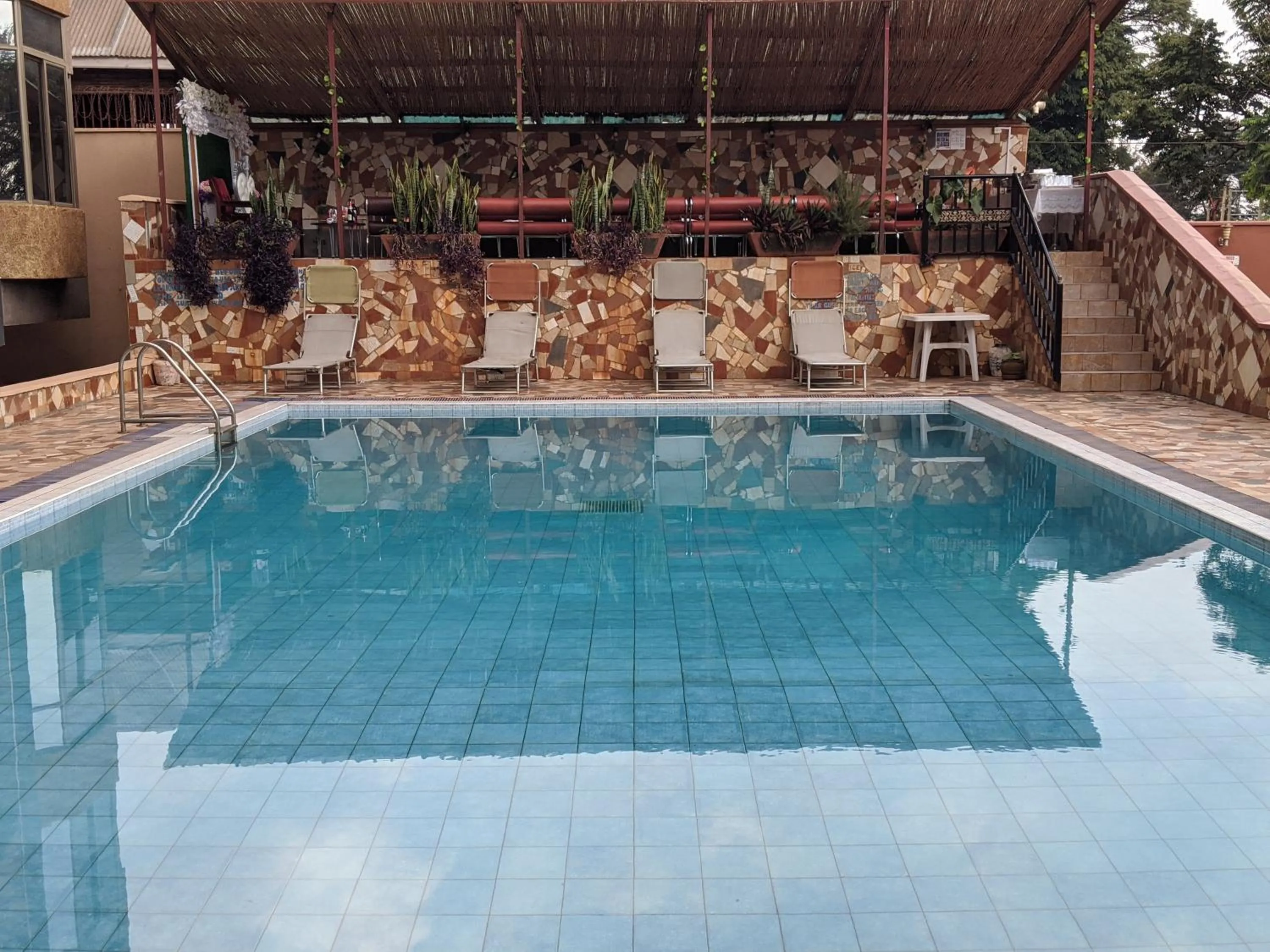 Swimming pool in Prestige Hotel Suites