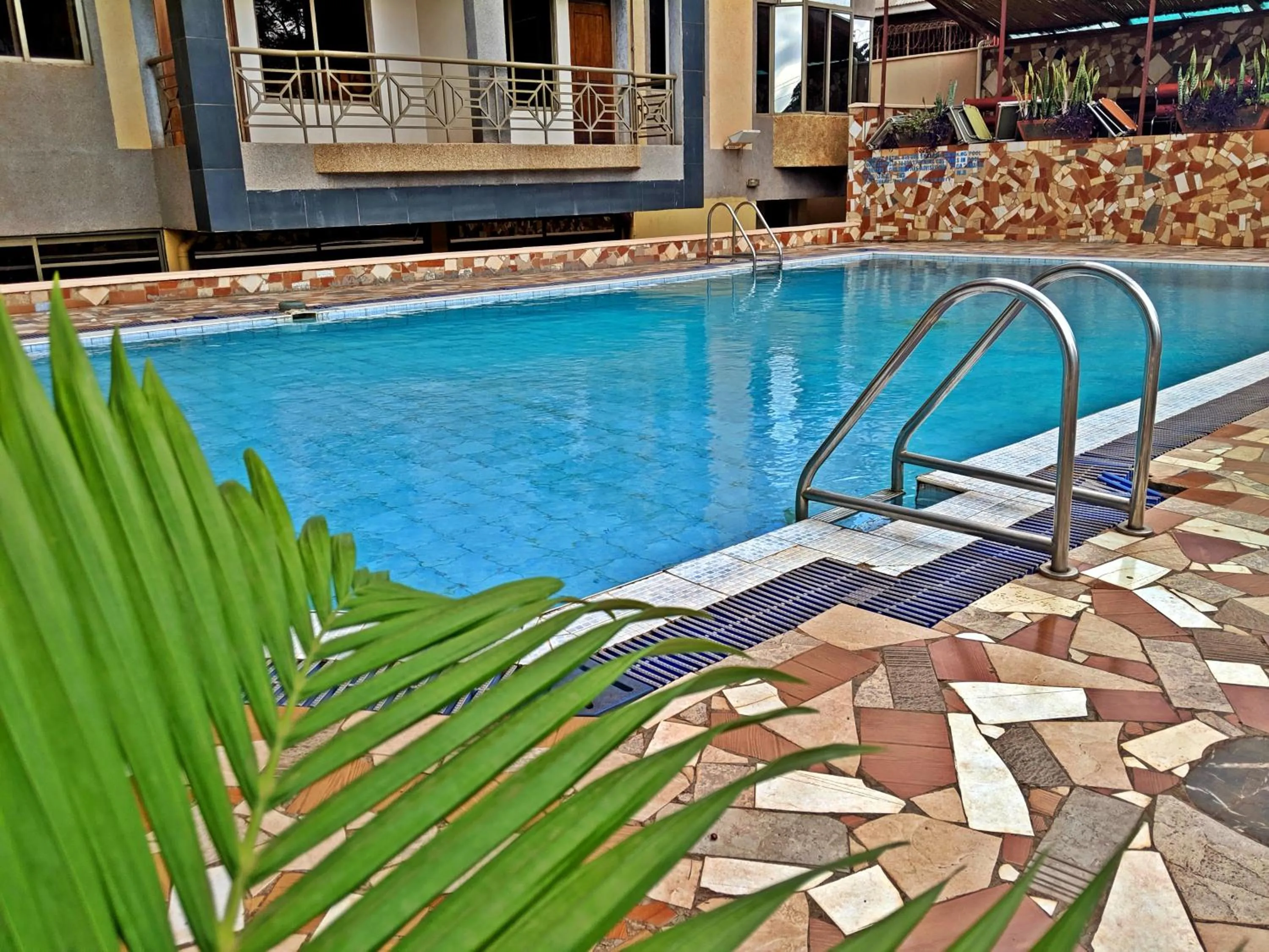 Swimming pool in Prestige Hotel Suites