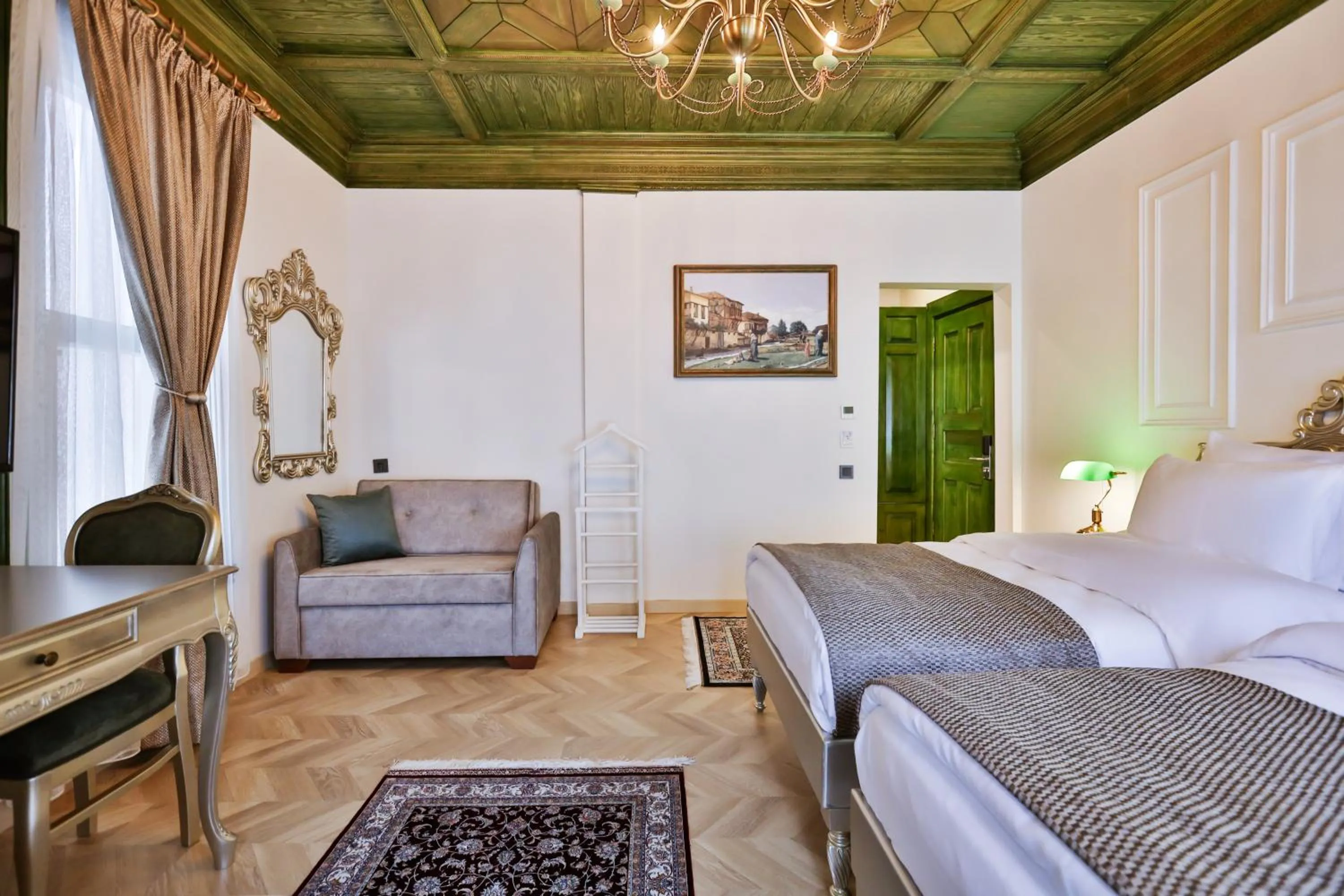 Bed in Emerald Mansion Hotel