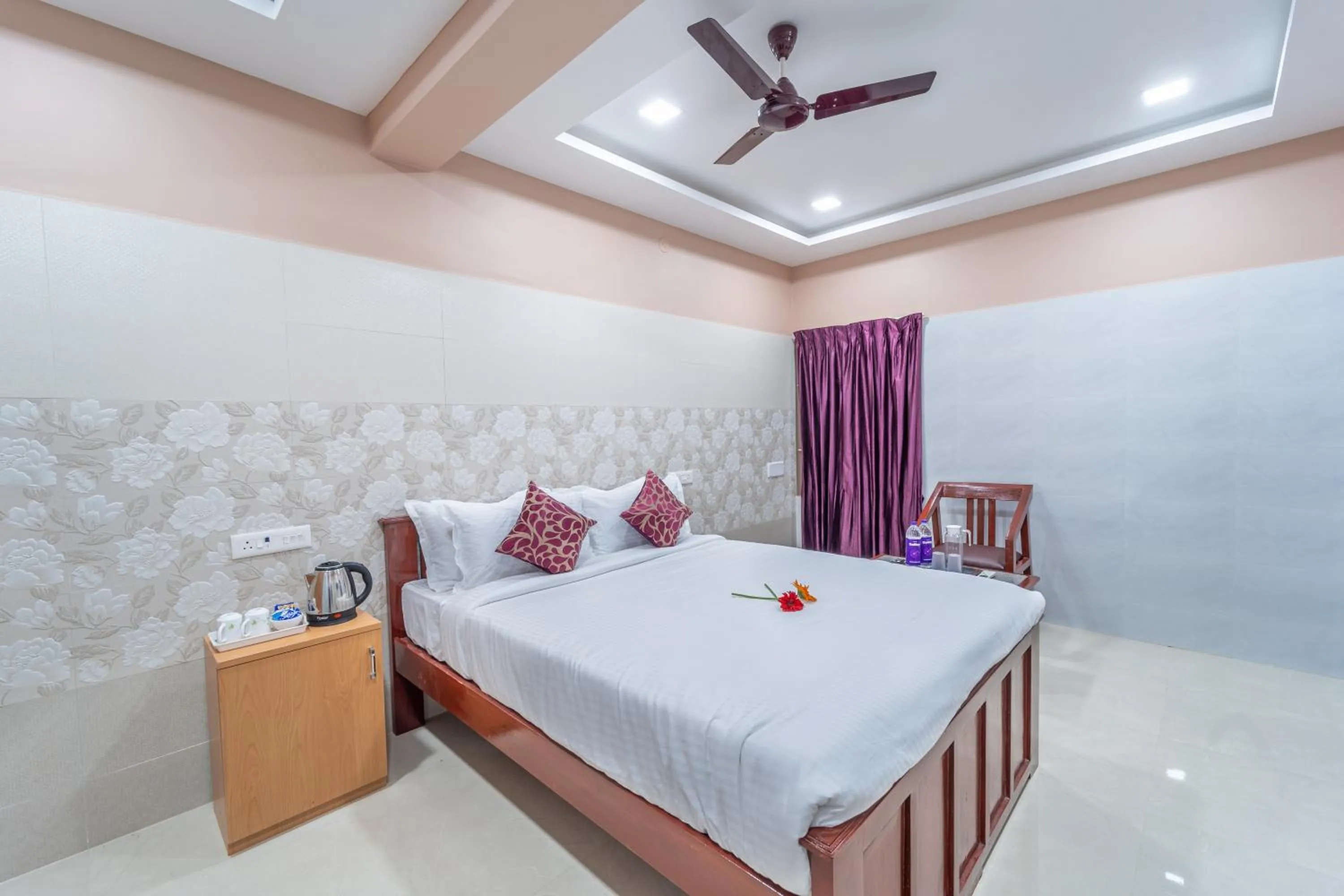 Photo of the whole room, Bed in Sam Residency