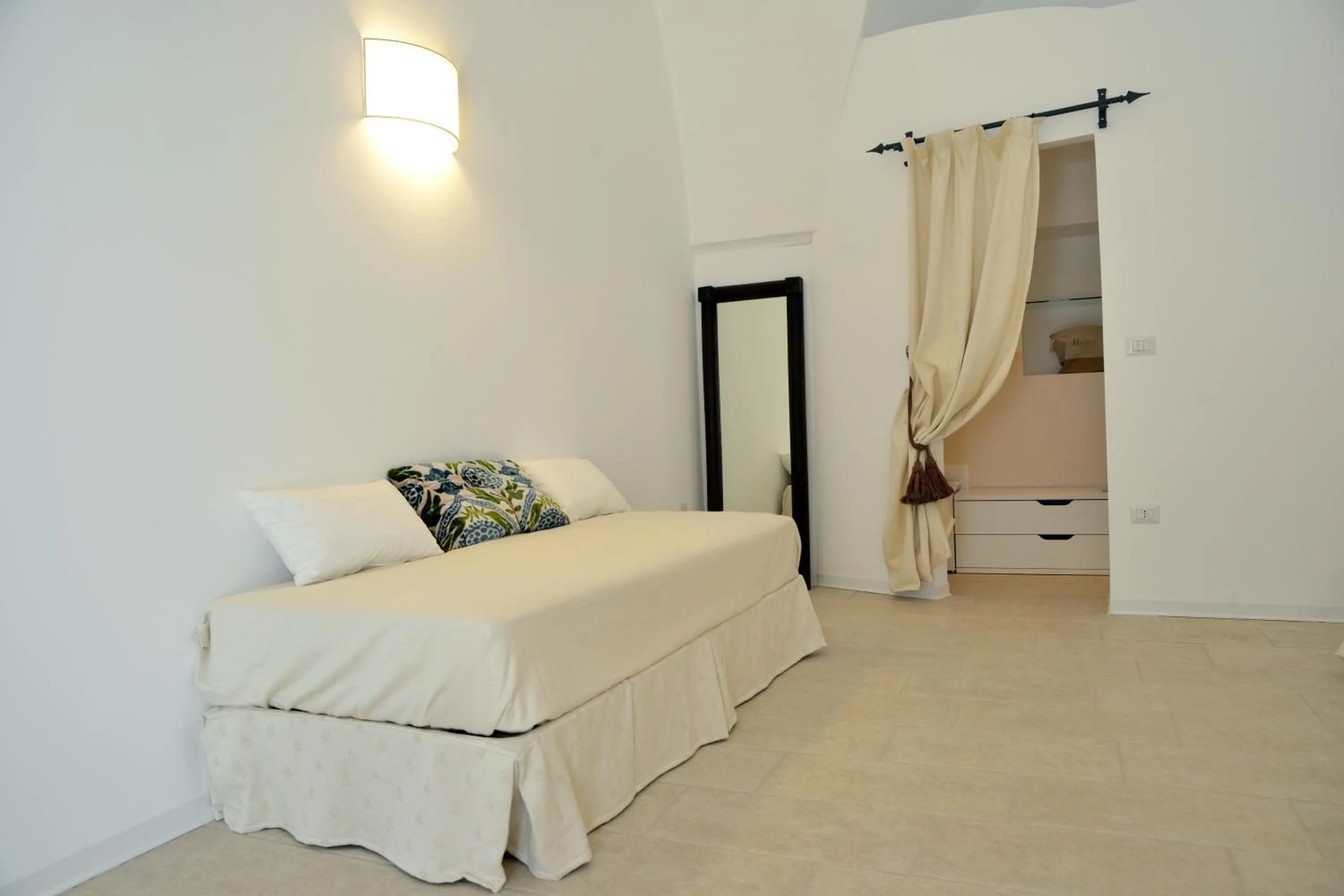 Seating area, Bed in Masseria Palane