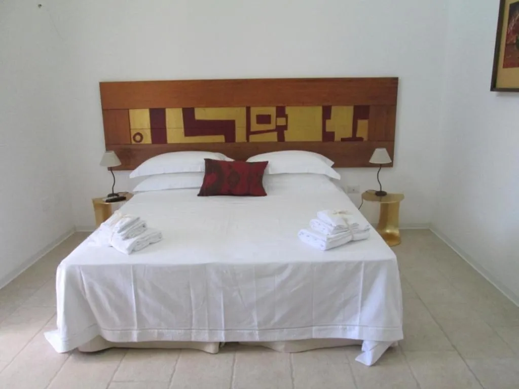 Photo of the whole room, Bed in Masseria Palane
