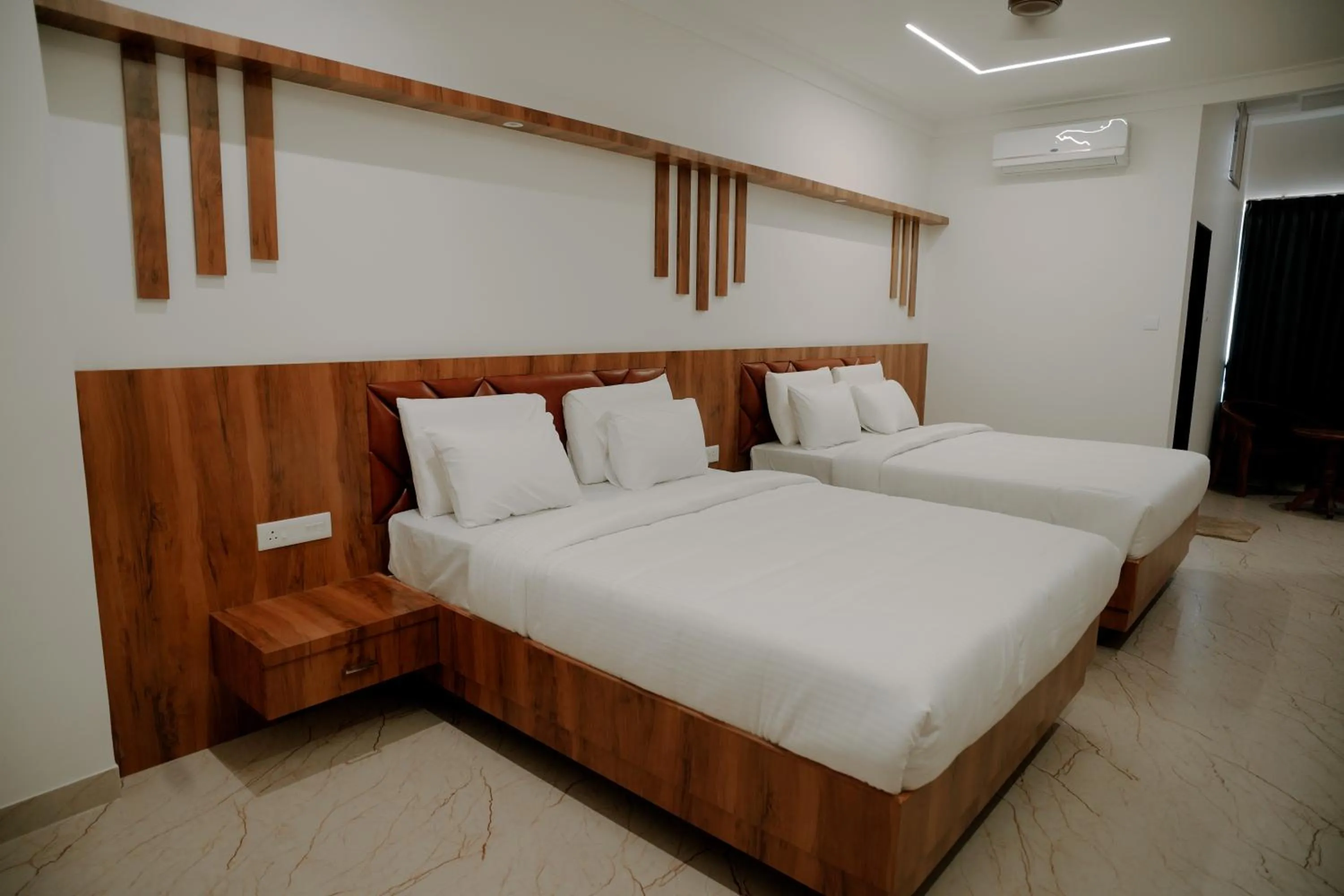 Deluxe Family Room in Shambhavi Hotel And Convention Centre