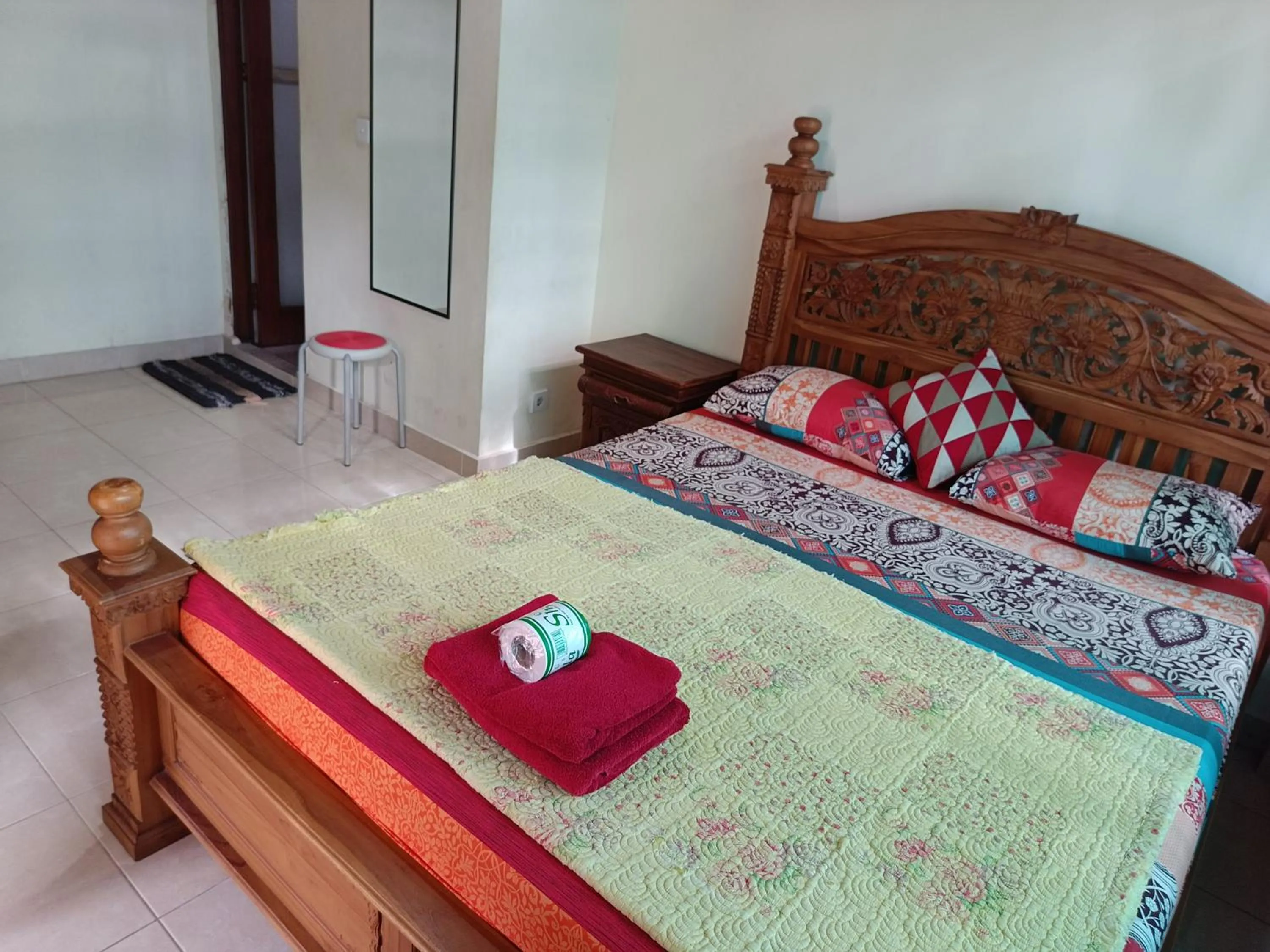 Bed in Nyoman House Ubud