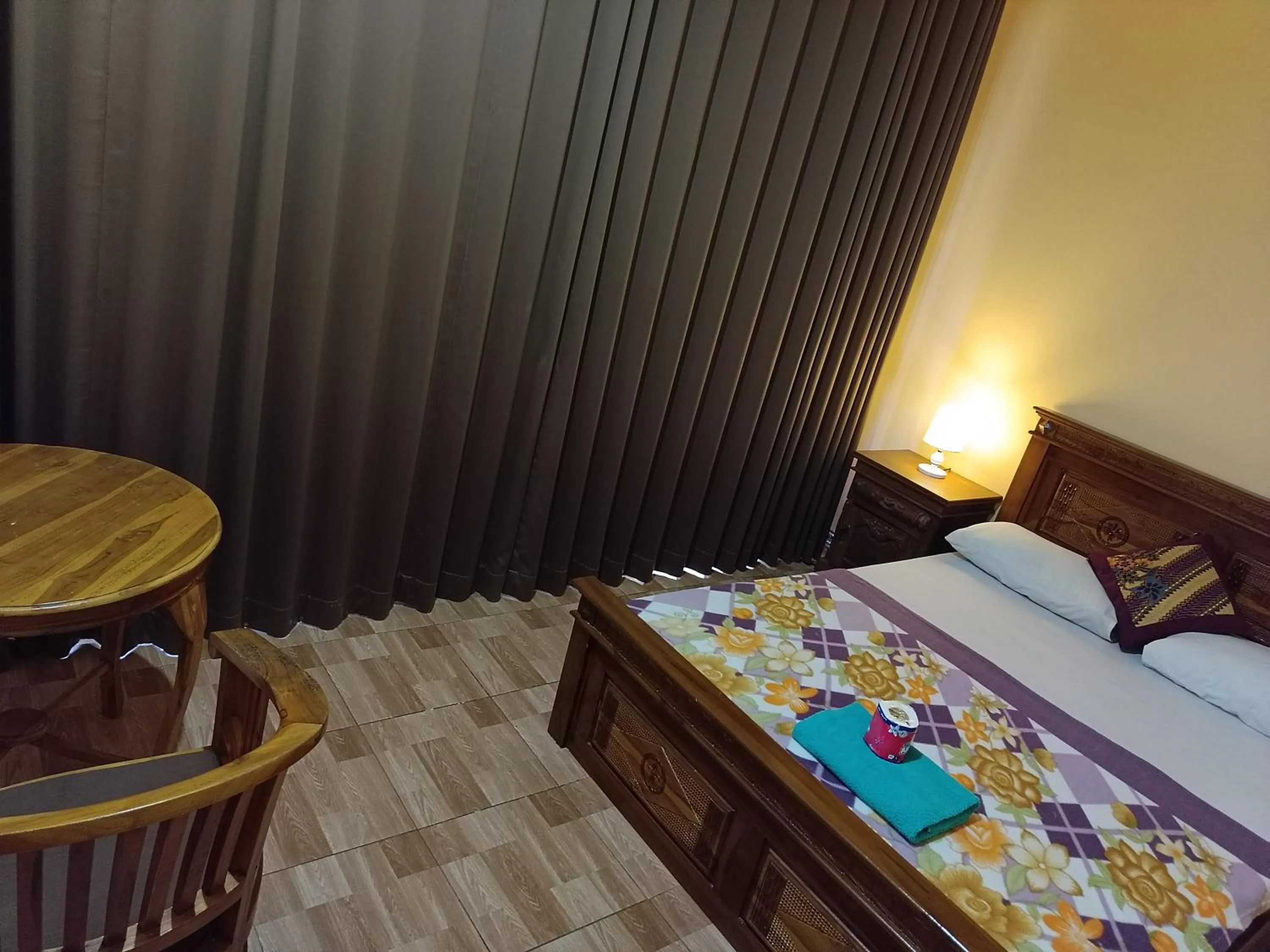 Bed in Nyoman House Ubud