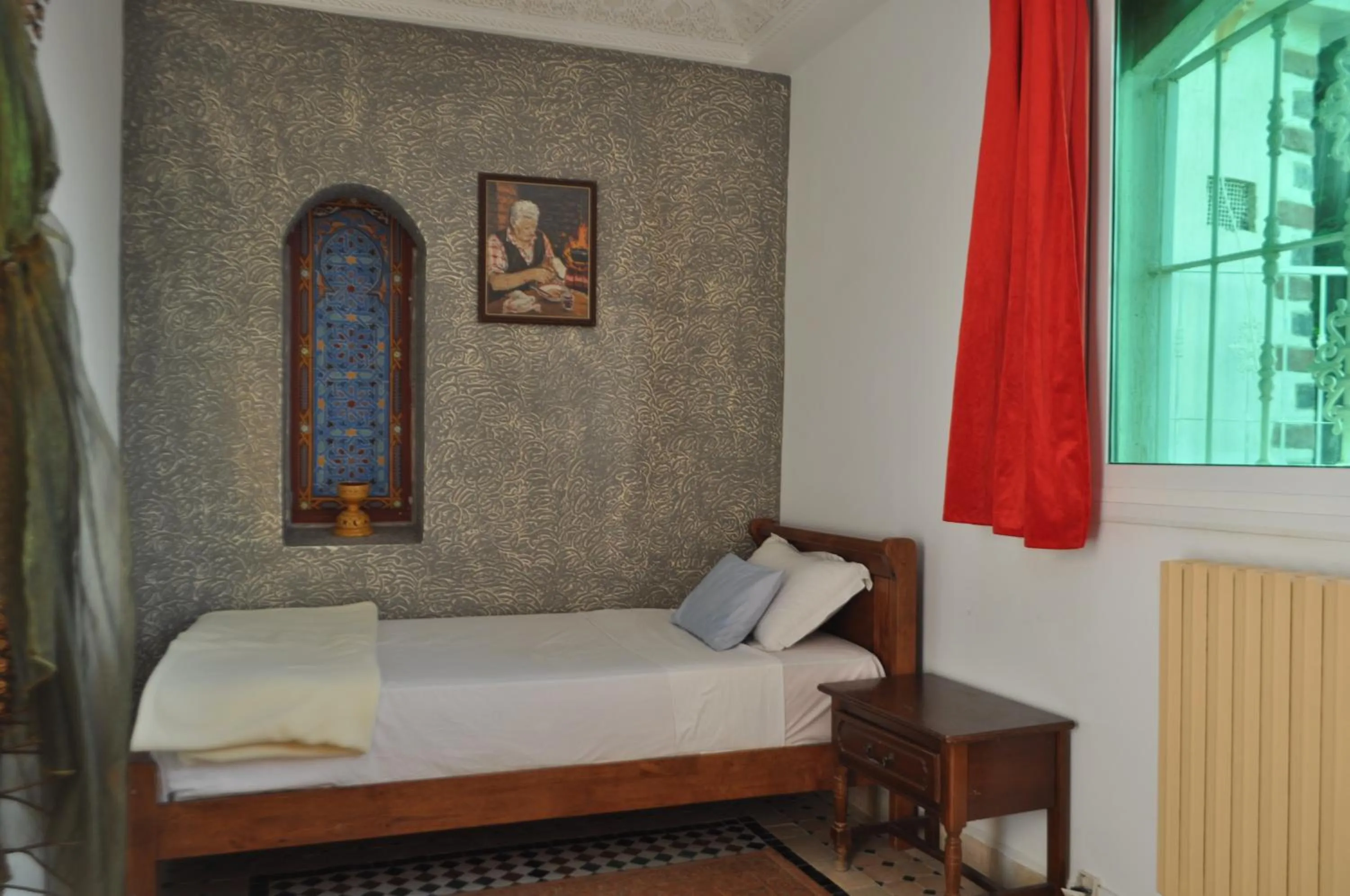 Bed in Malabata Guest House