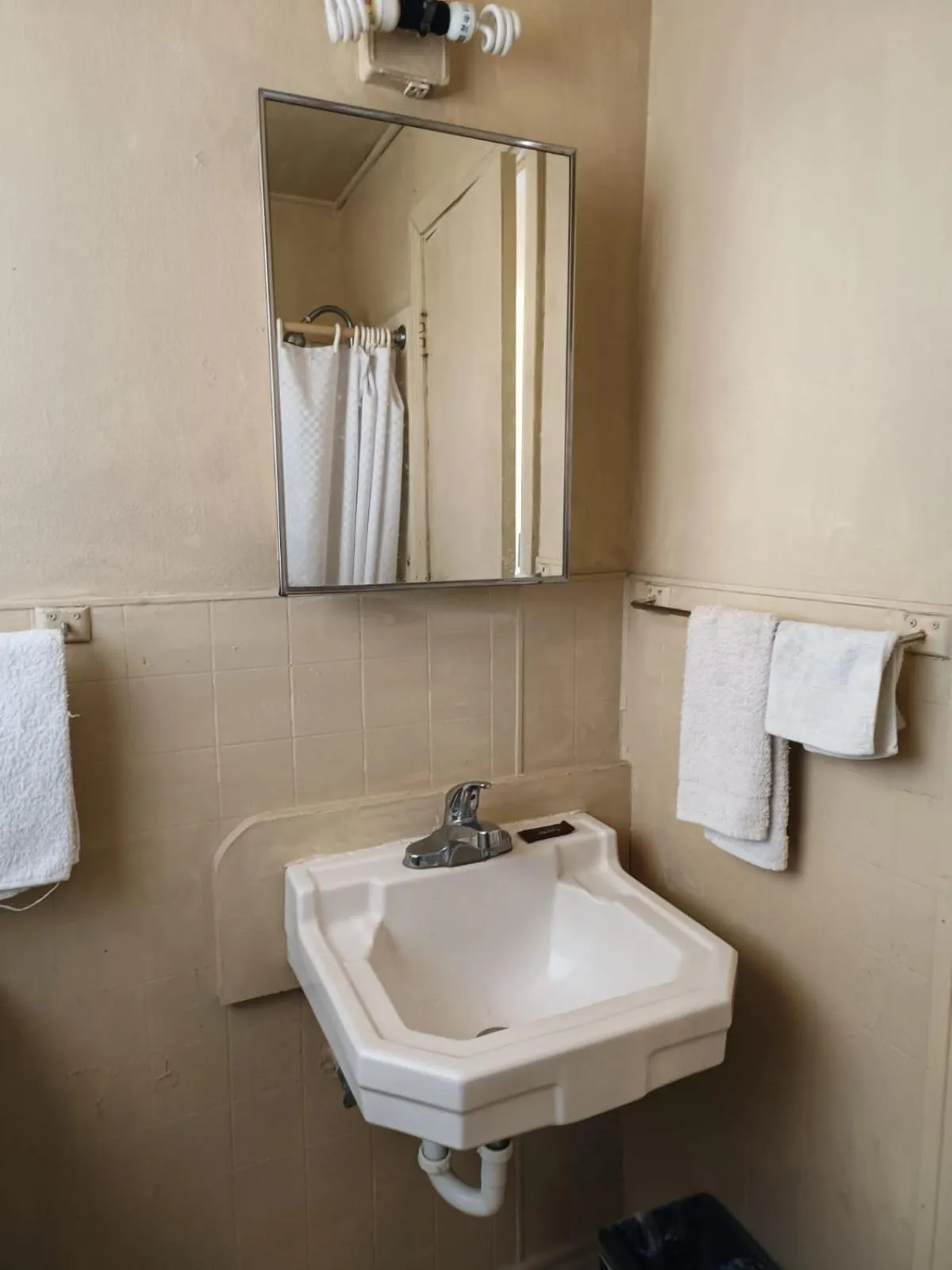 Bathroom in Triangle Motel by OYO Mexia Texas