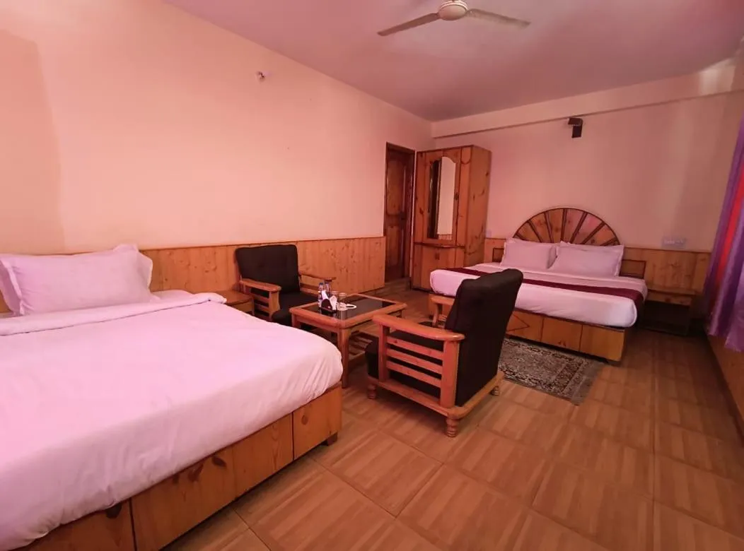 Bed in Hotel Purnima - A Riverside Hotel in Kasol