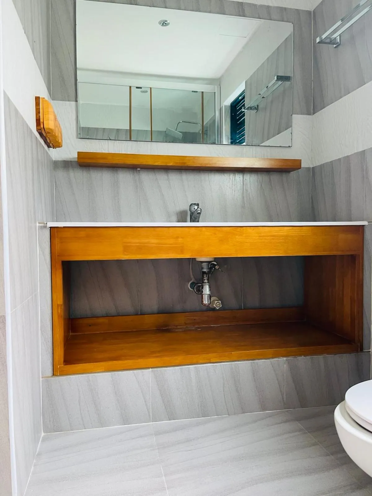 Toilet in Long Beach Laamu Hotel