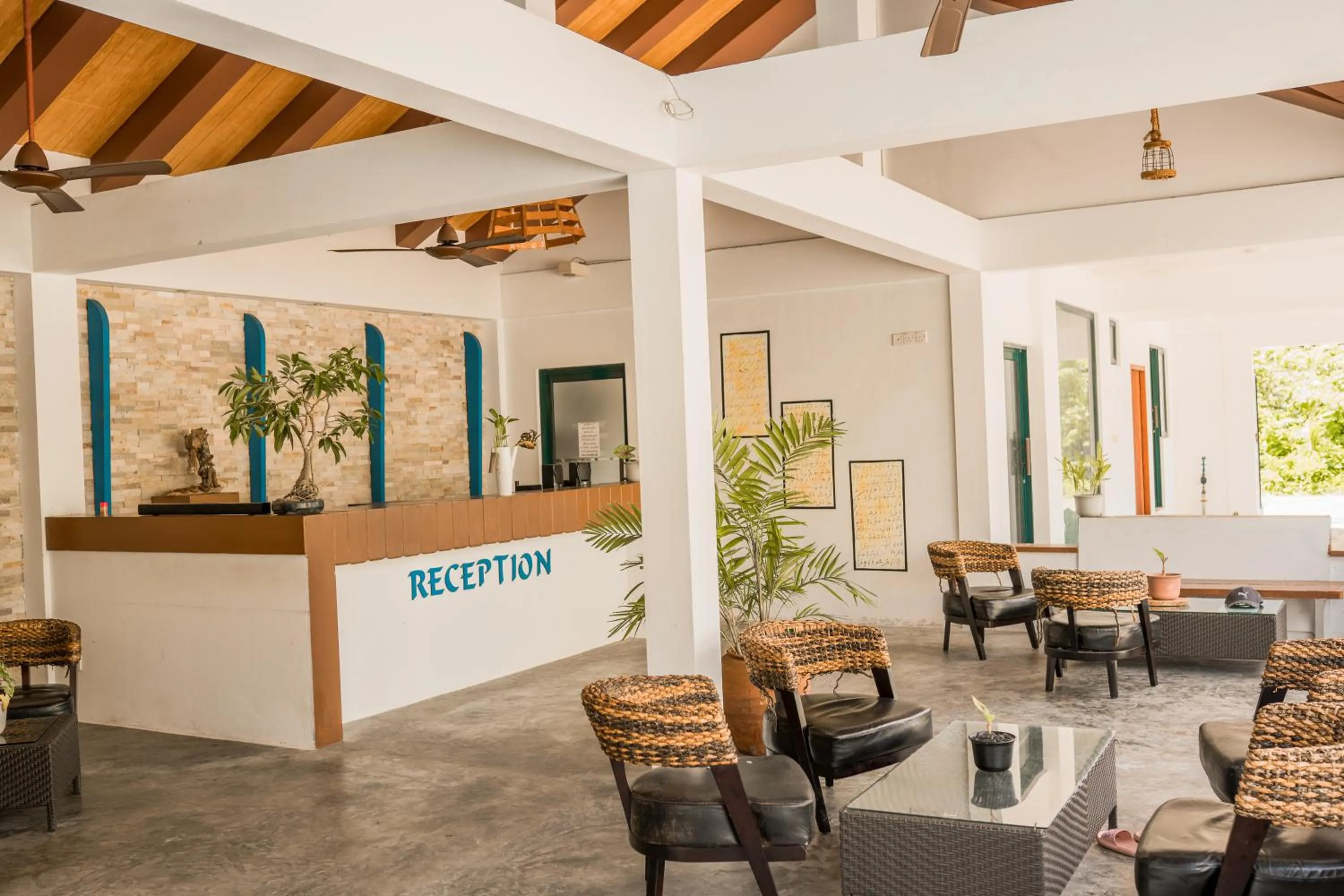 Seating area in Long Beach Laamu Hotel