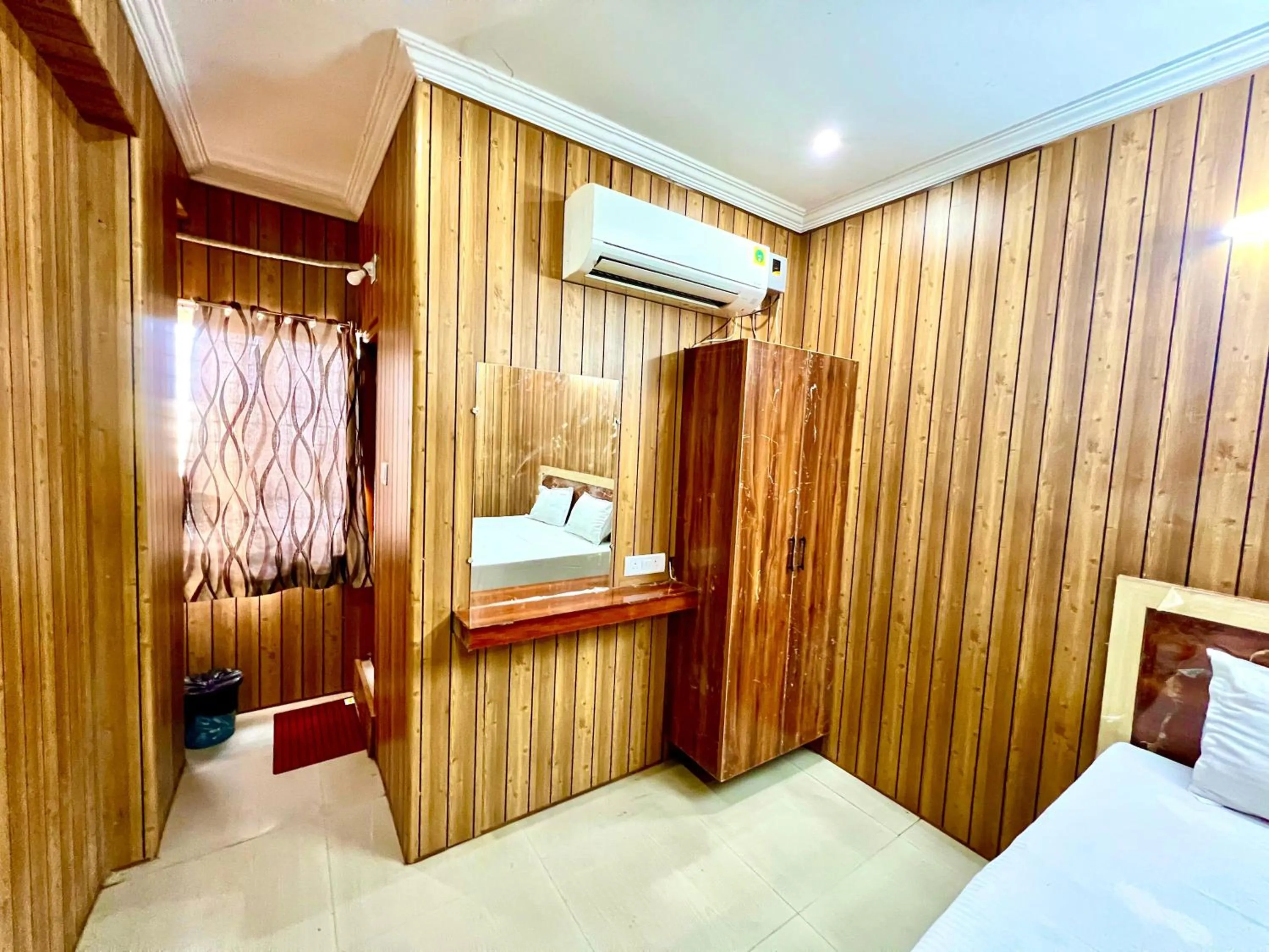 Bed in Hotel Govindh Heights