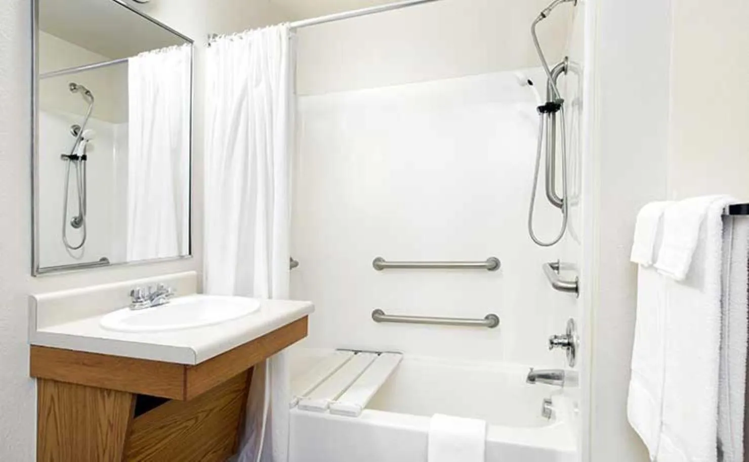 Bathroom in WoodSpring Suites Louisville Jeffersontown
