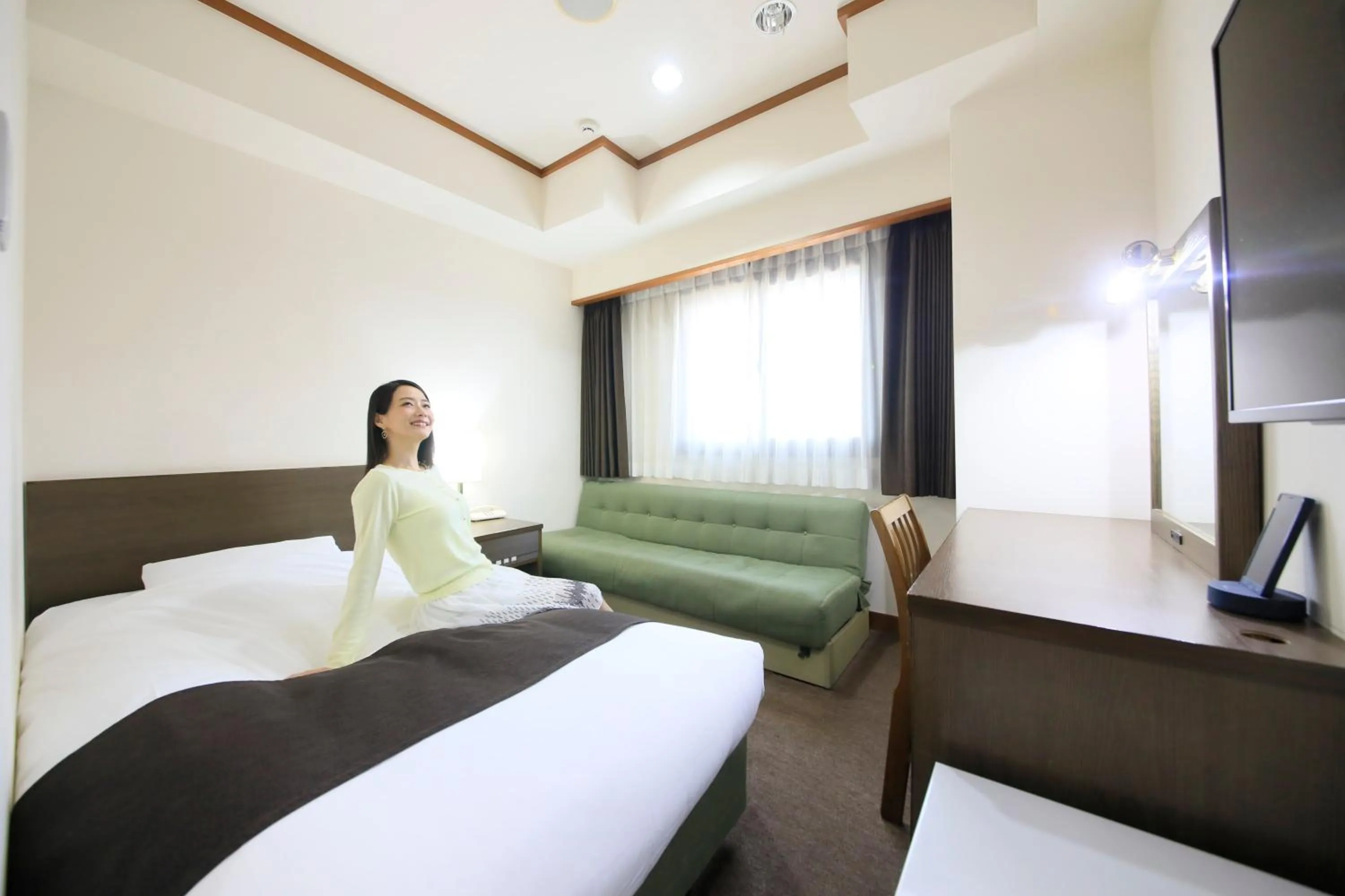 People, Bed in Maple Inn Makuhari