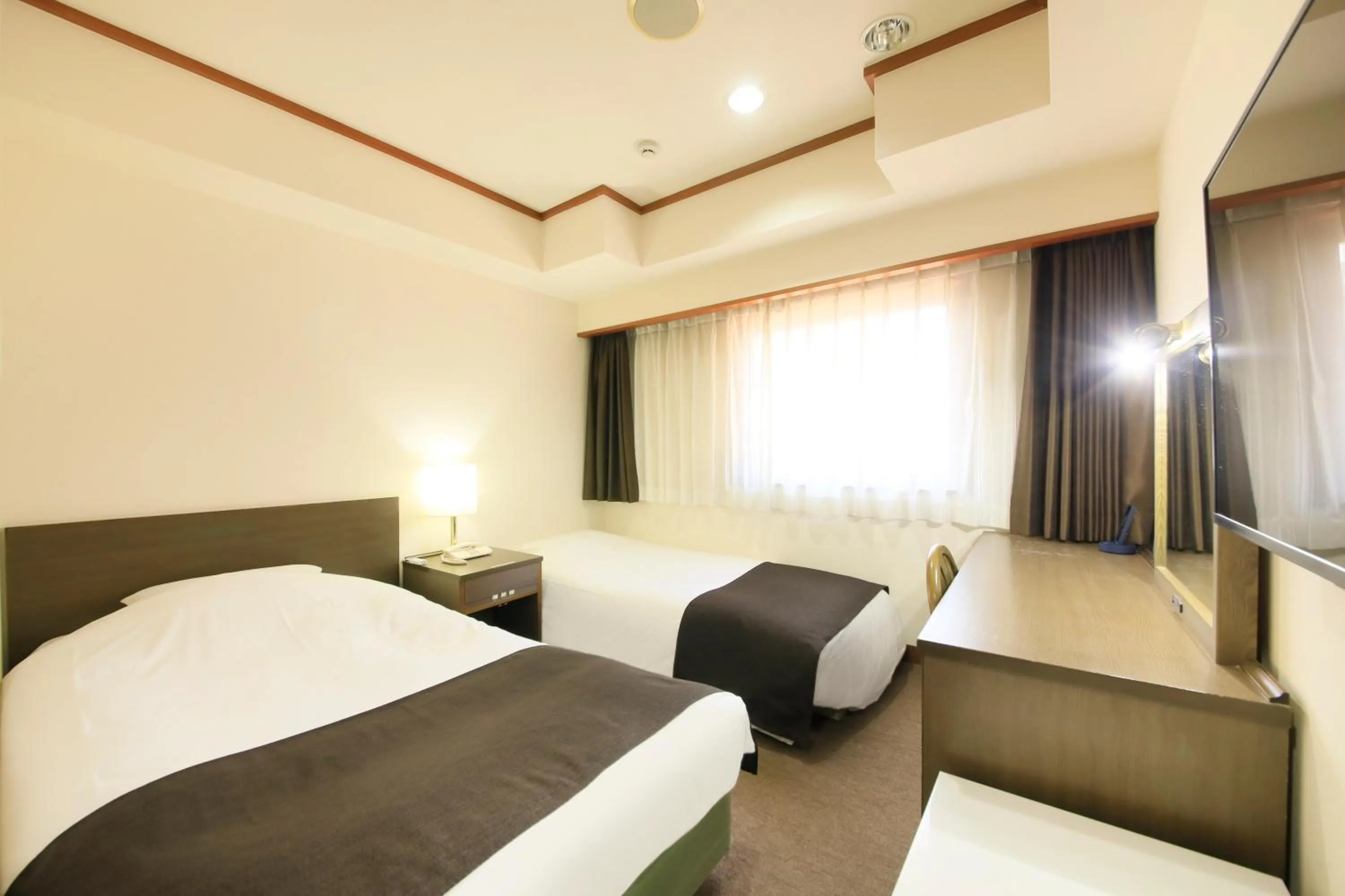 Bed in Maple Inn Makuhari