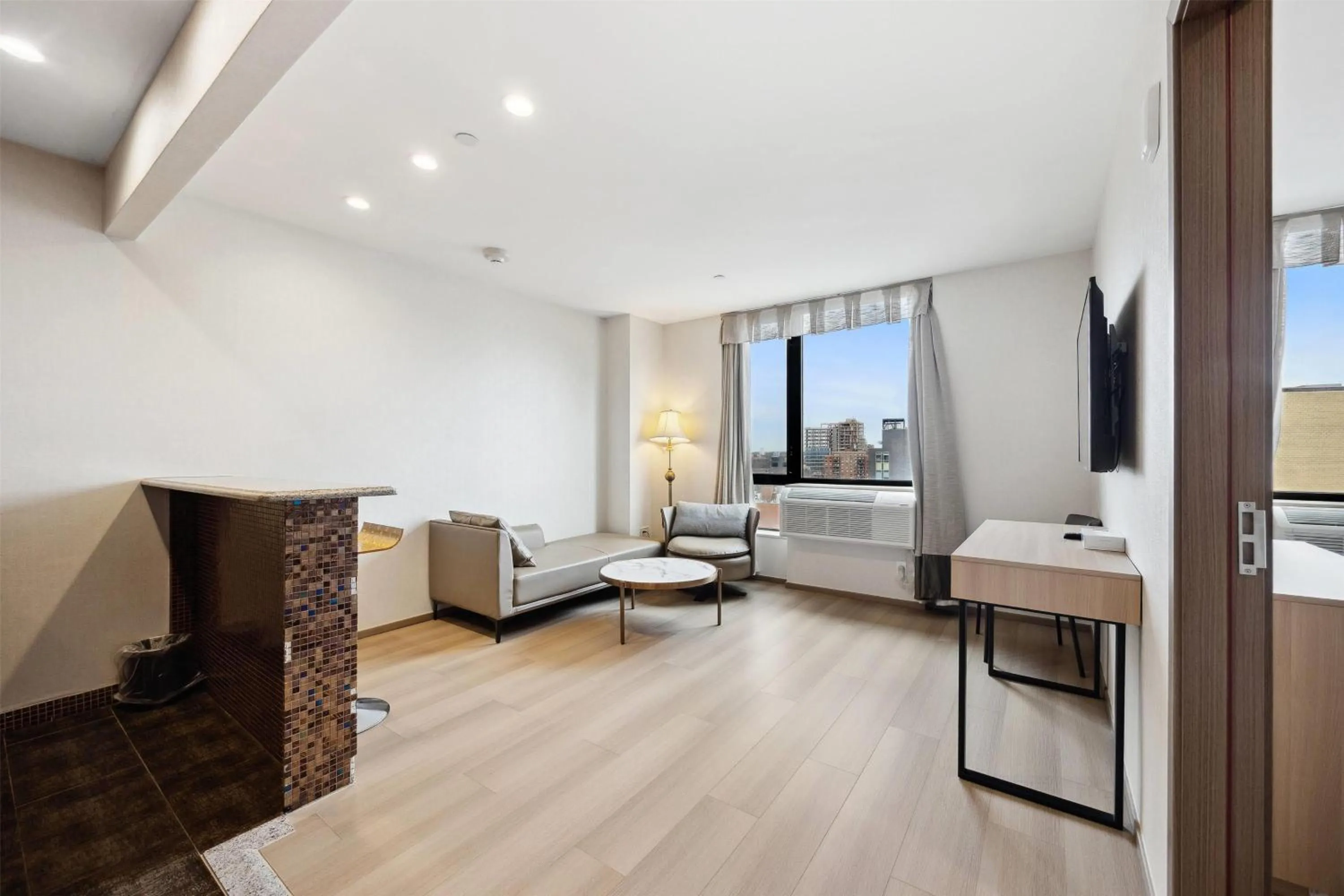 Living room, Bed in Ramada by Wyndham Flushing Queens