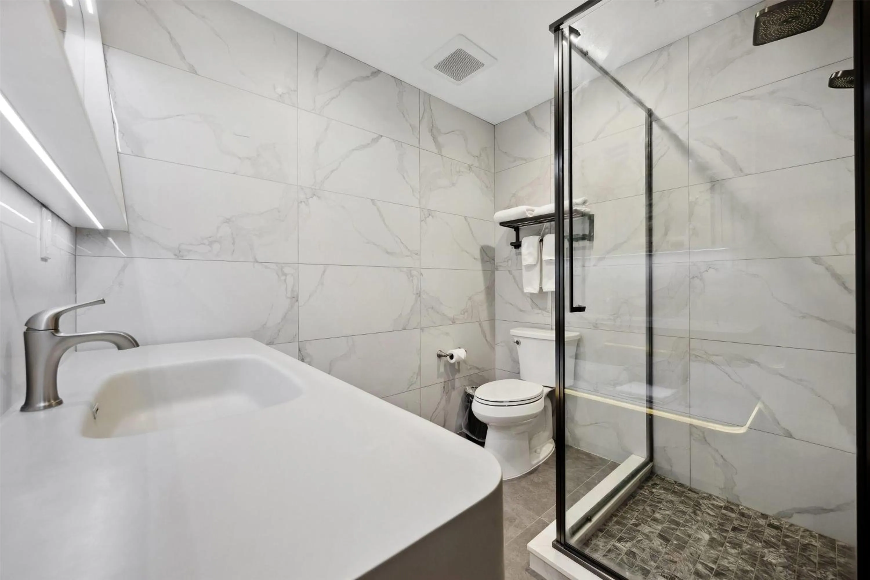 Bathroom in Ramada by Wyndham Flushing Queens