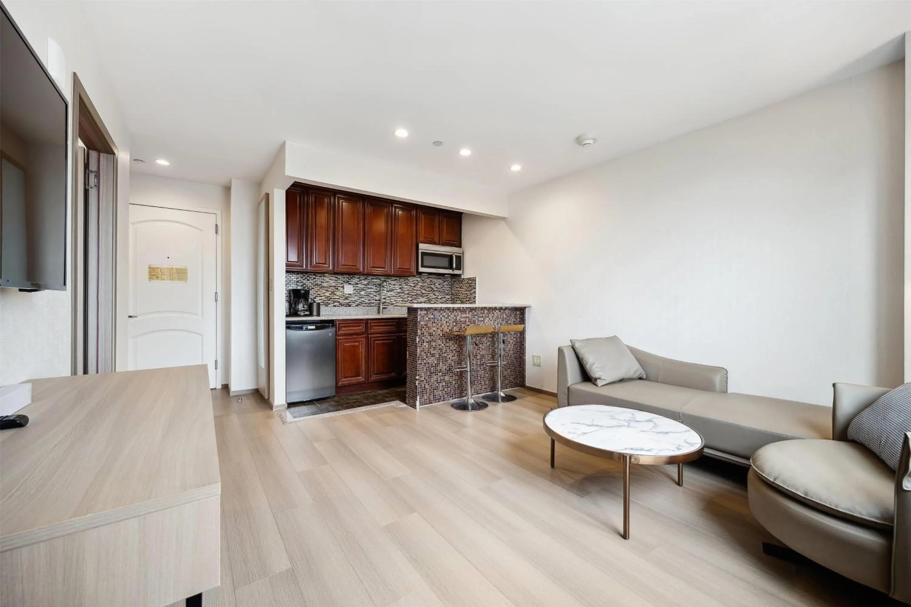 Living room in Ramada by Wyndham Flushing Queens