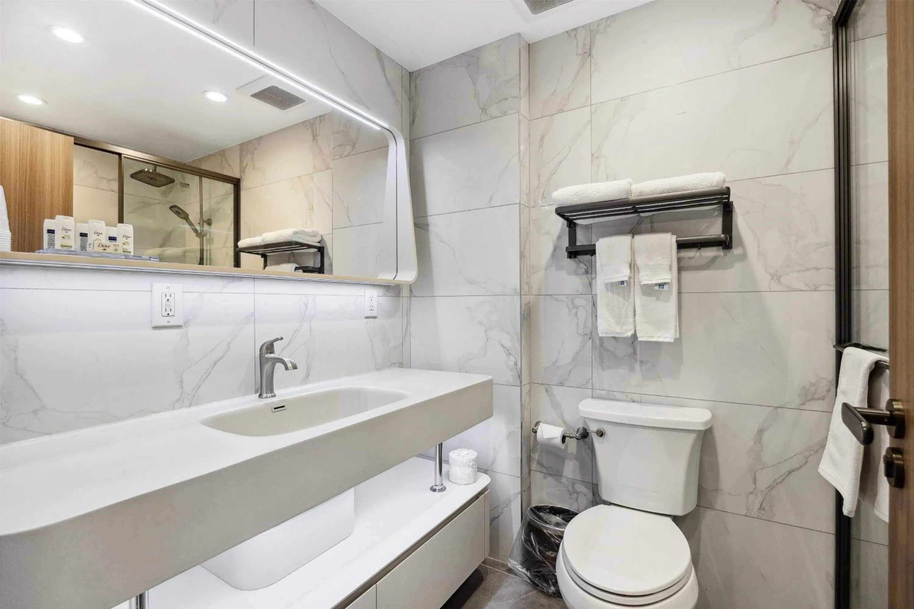 Bathroom in Ramada by Wyndham Flushing Queens