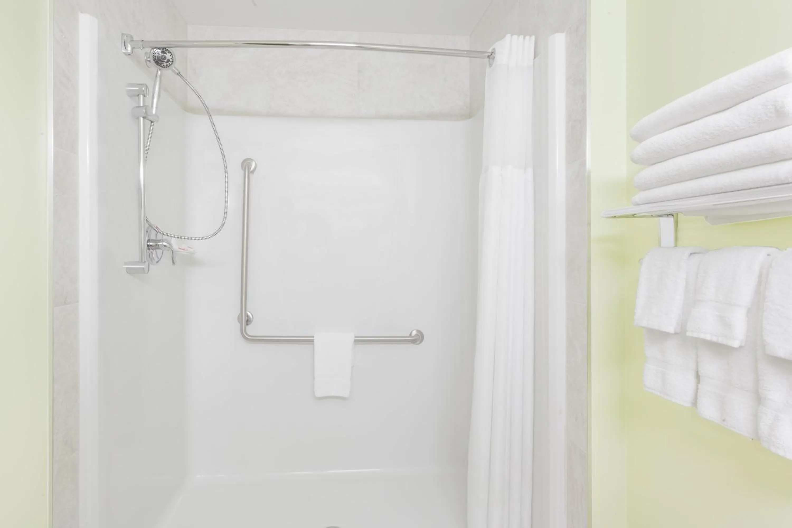 Shower in Ramada by Wyndham Carlyle