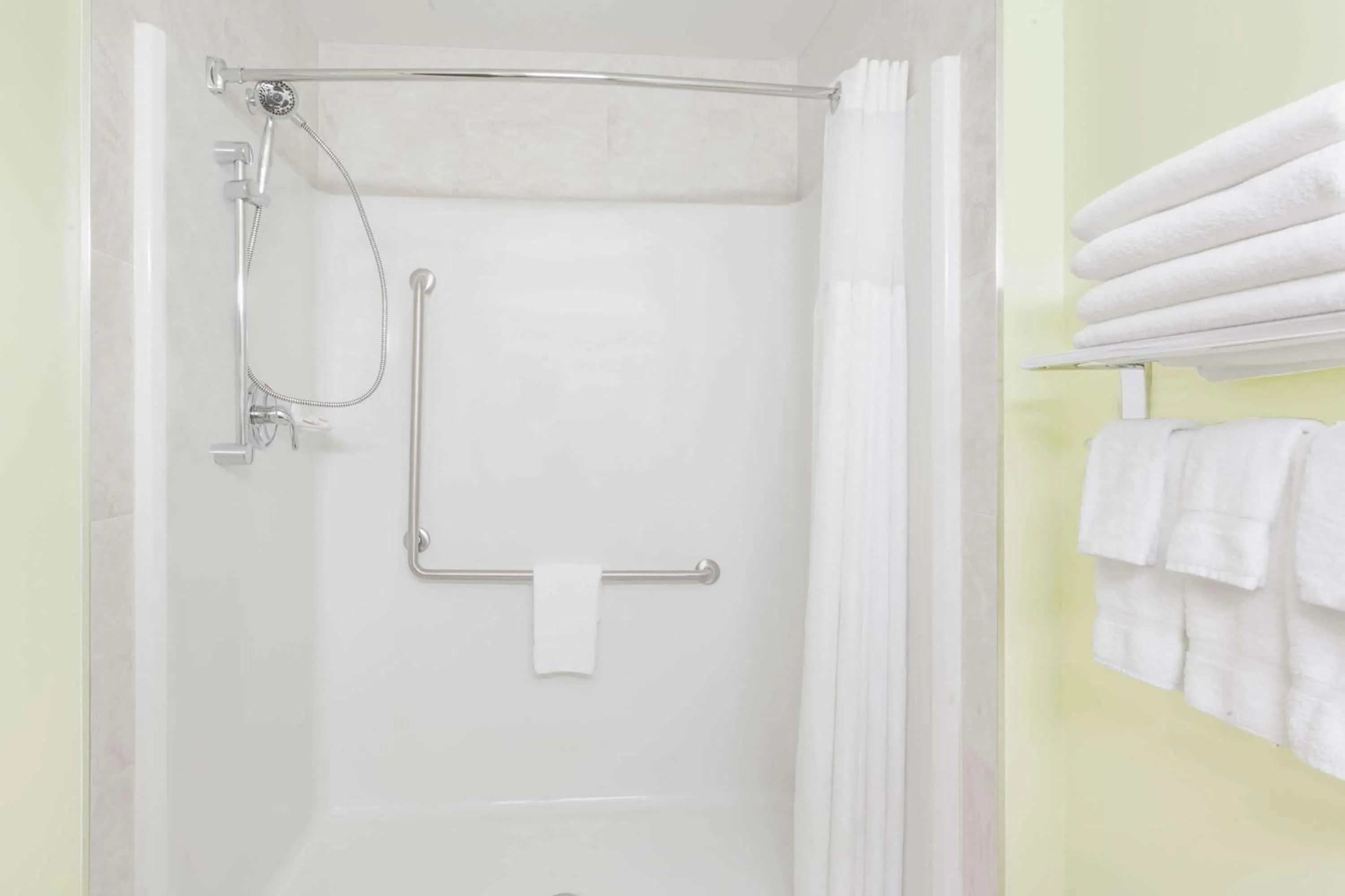 Shower in Ramada by Wyndham Carlyle