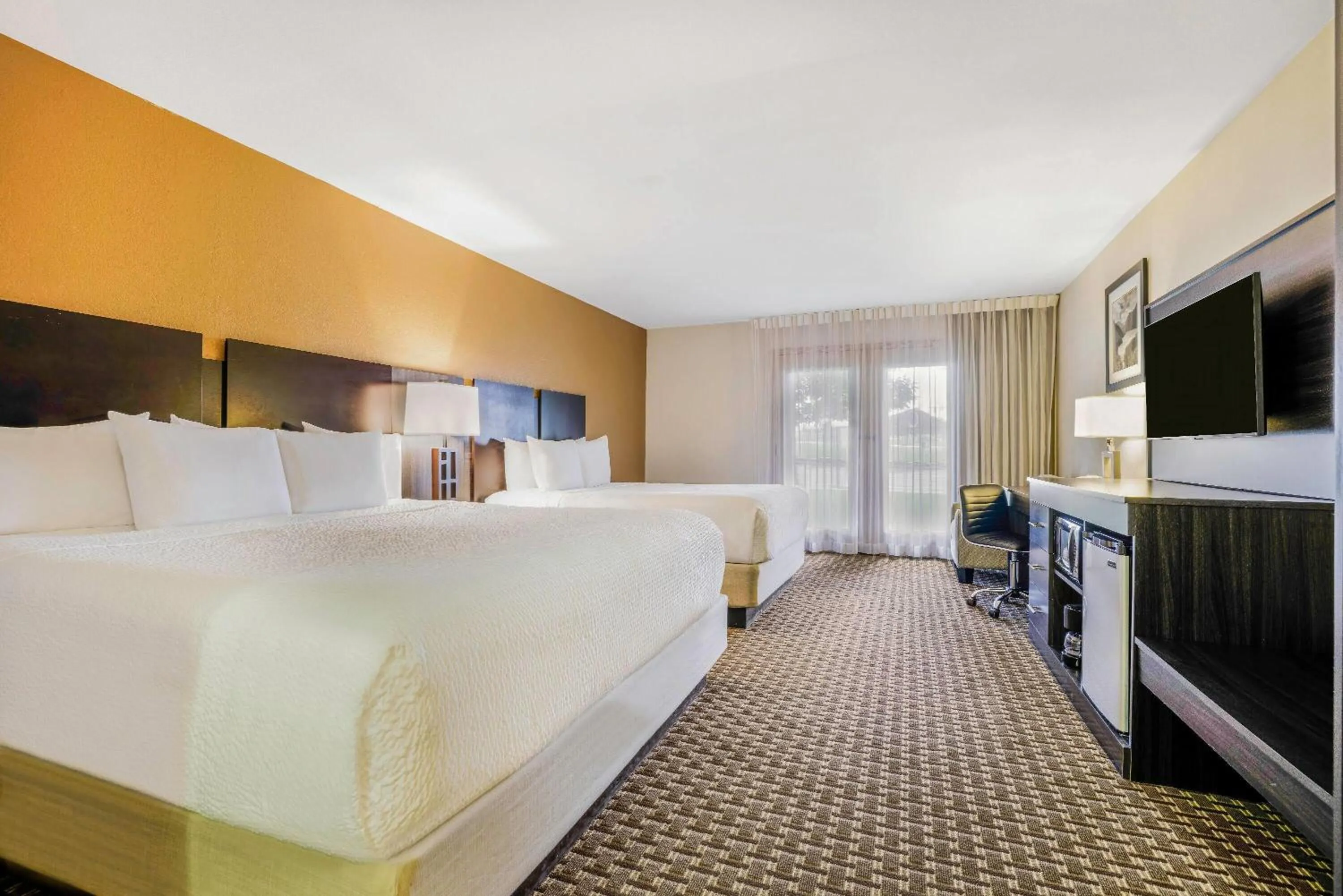 Bed in Baymont by Wyndham Cortez