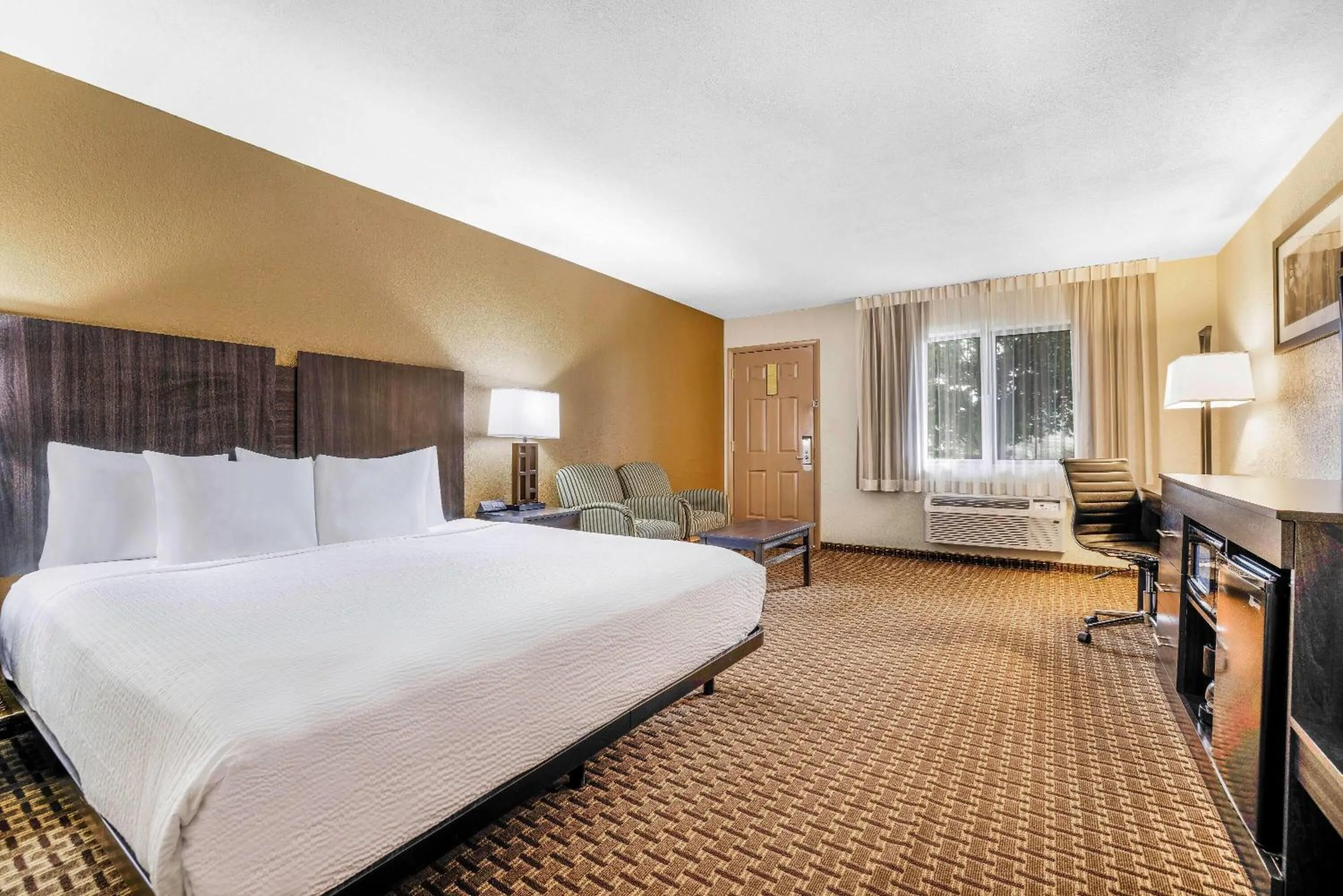 Bed in Baymont by Wyndham Cortez