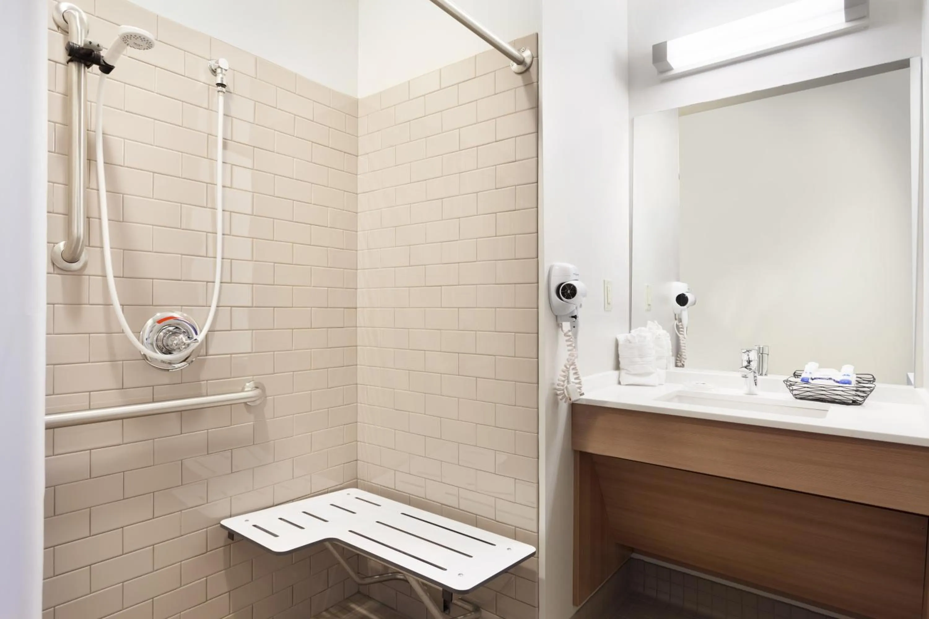 Bathroom in Microtel Inn & Suites by Wyndham Georgetown Delaware Beaches